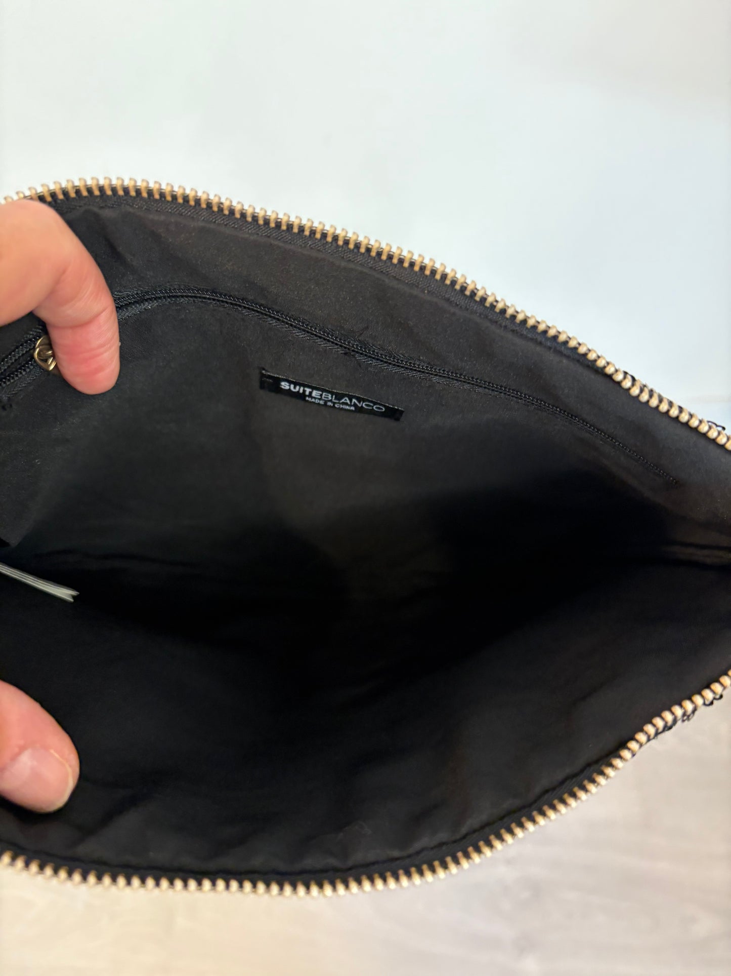 OTHERS. Mini sequin clutch bag