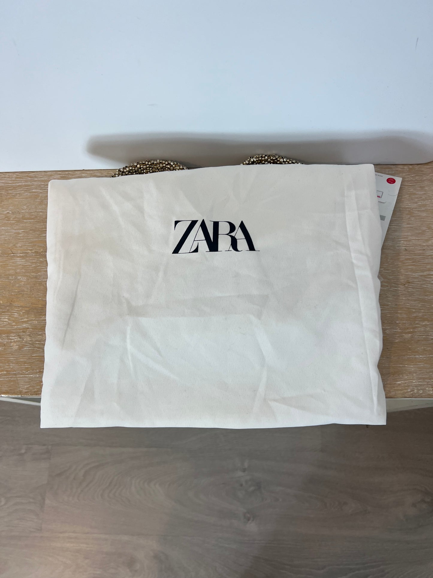ZARA. Bolso mini abalorios dorados