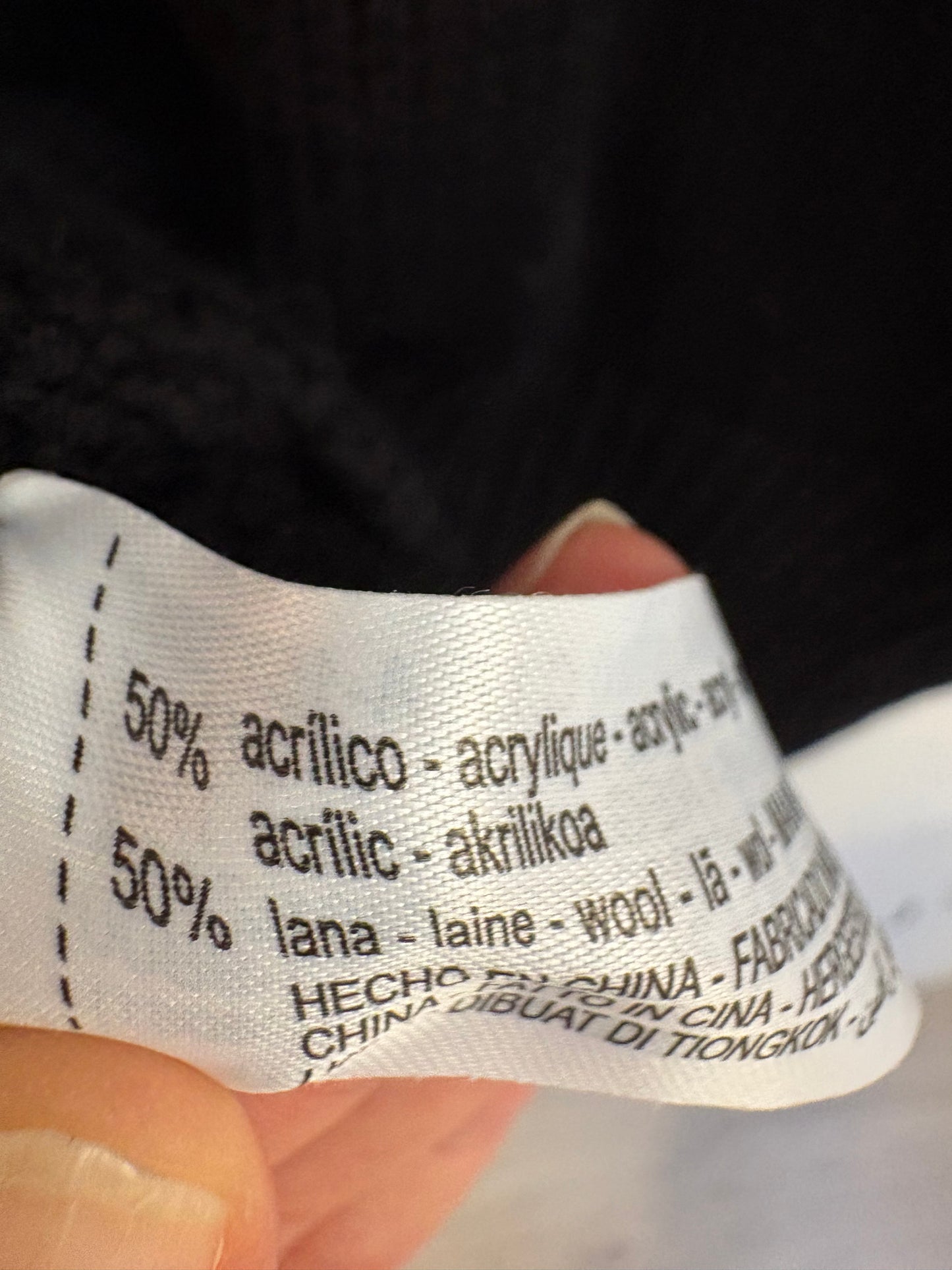 ZARA. Jersey negro cuello canalé con lana. T S