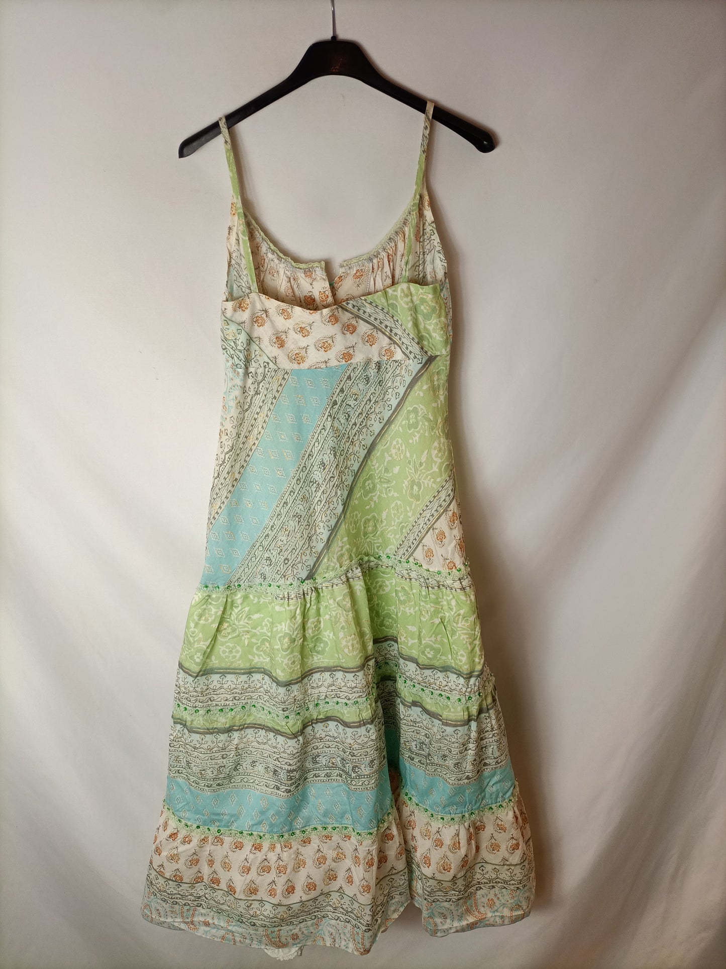 LIBERTY FASHION. Floral print dress with sequin mini skirt. TM