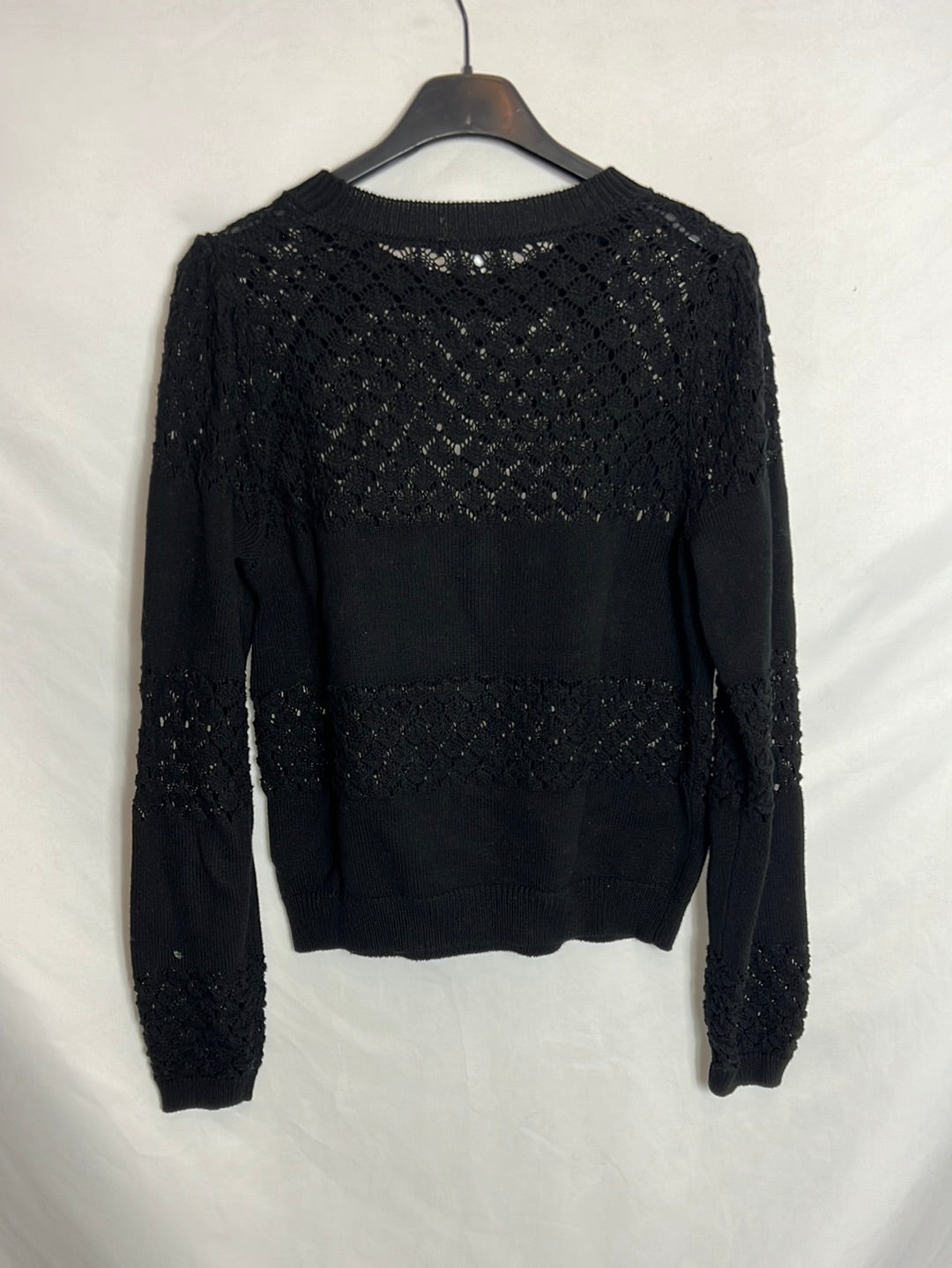 SCALPERS. Jersey negro calado. T S