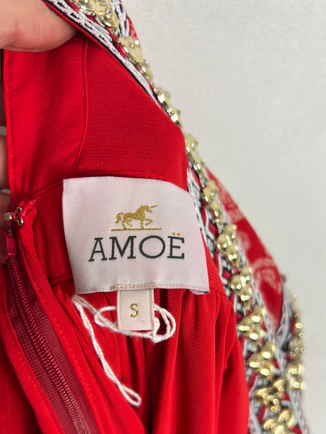 AMOË. Long red printed dress with neckline detail. TS