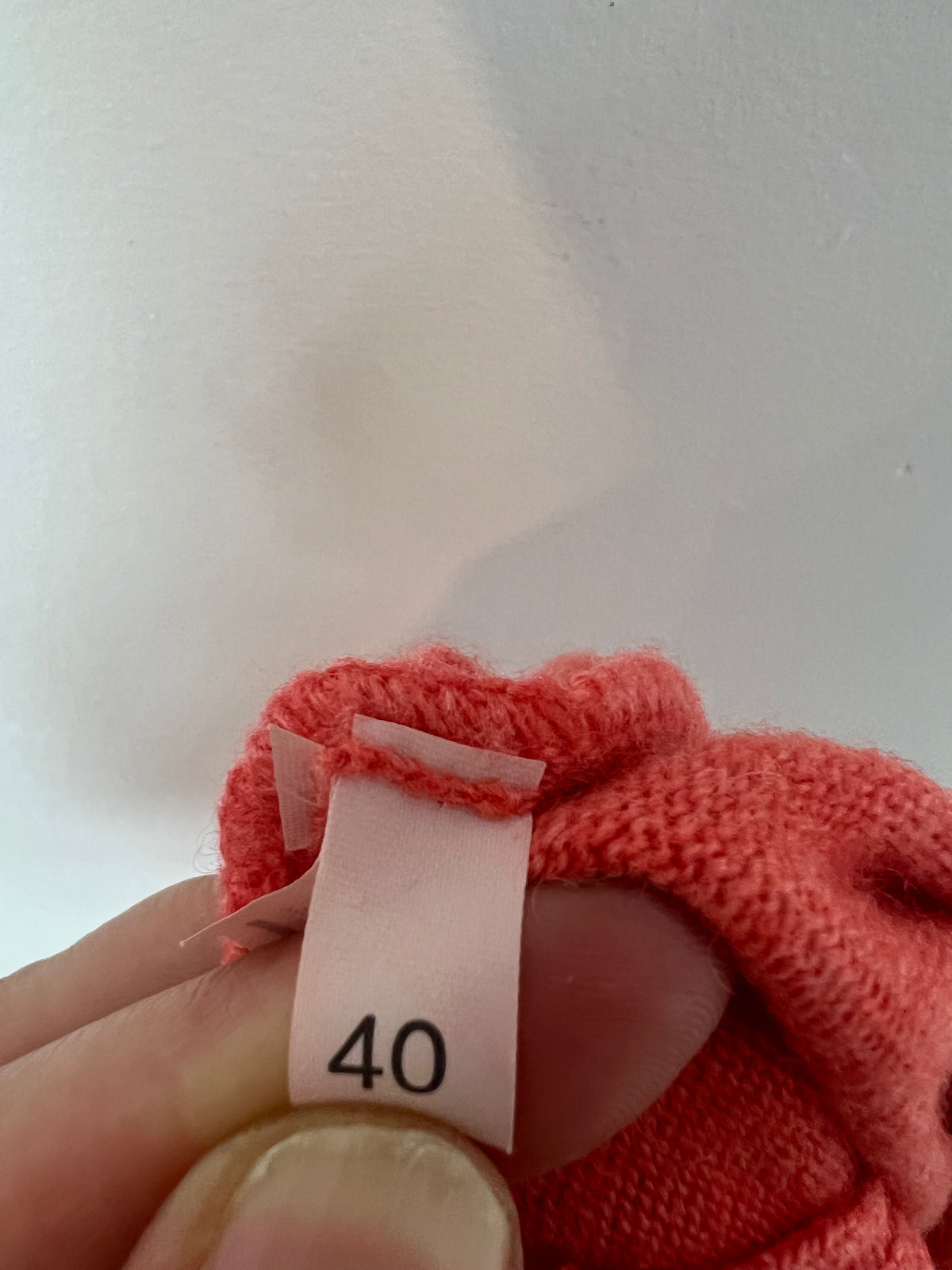 CASHMERE. Salmon cashmere button-down jacket. TS