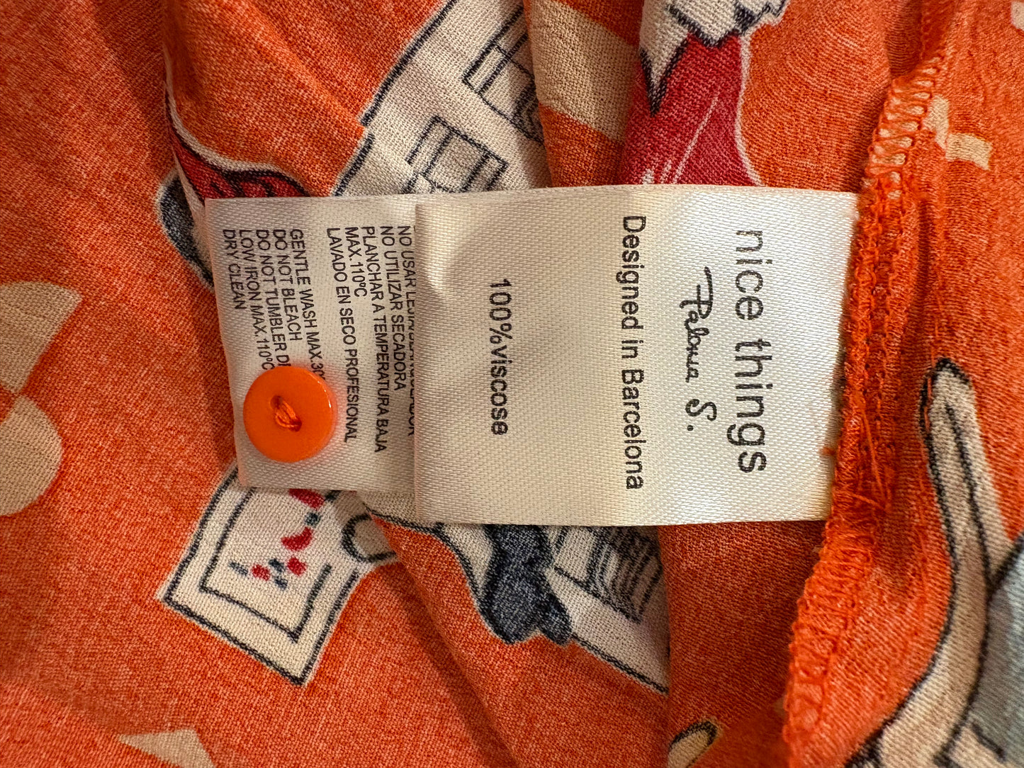 NICE THINGS. Orange dress with a patterned print, size 36