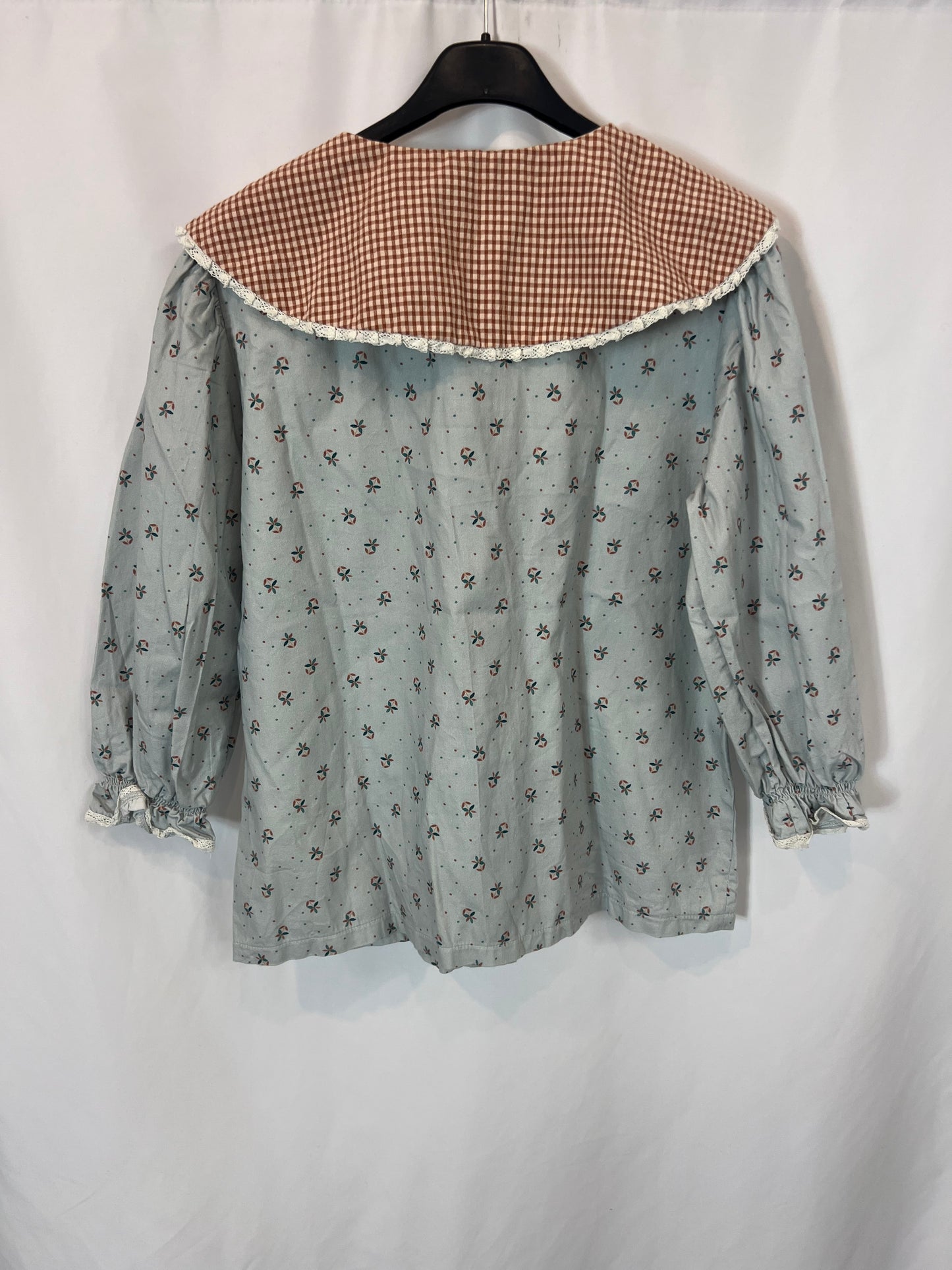 BIRINIT. Blue printed blouse with baby collar Tm