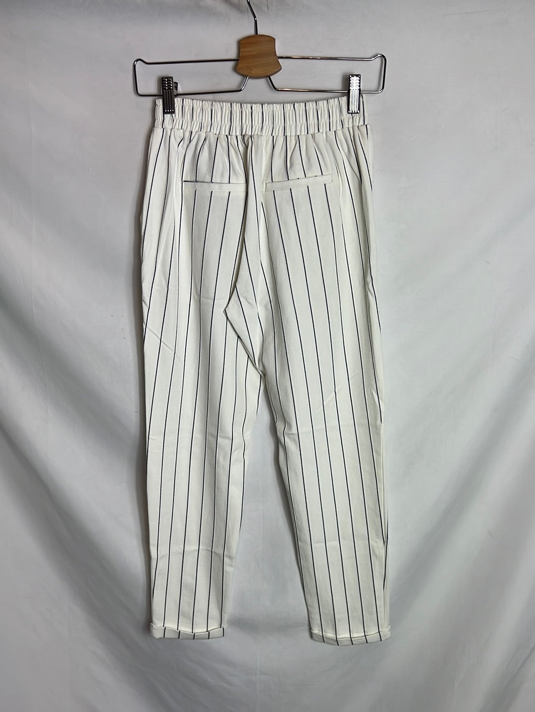 BERSHKA. White striped flowing trousers. TS