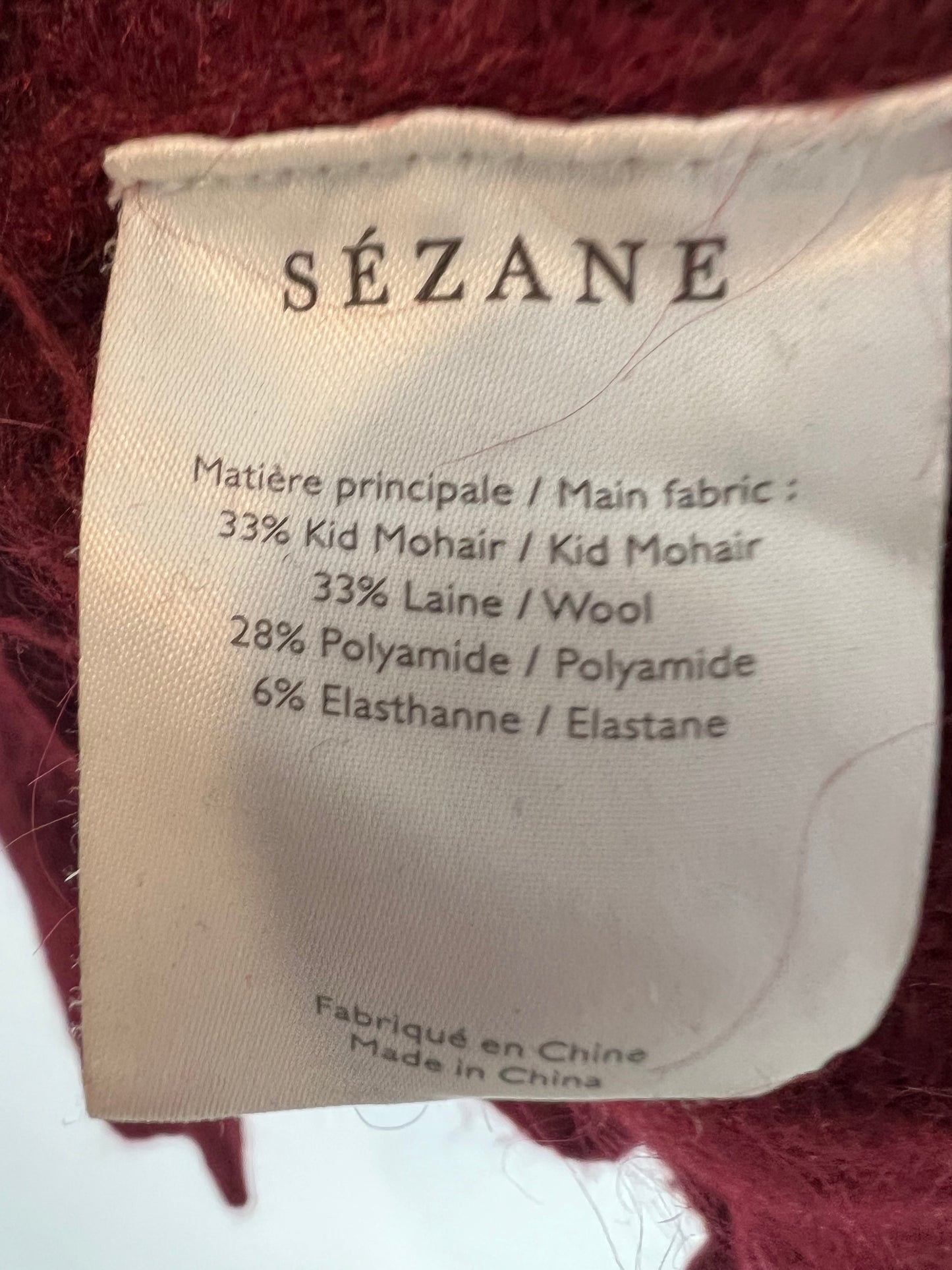 SEZANE. Burgundy sweater with Ts buttons