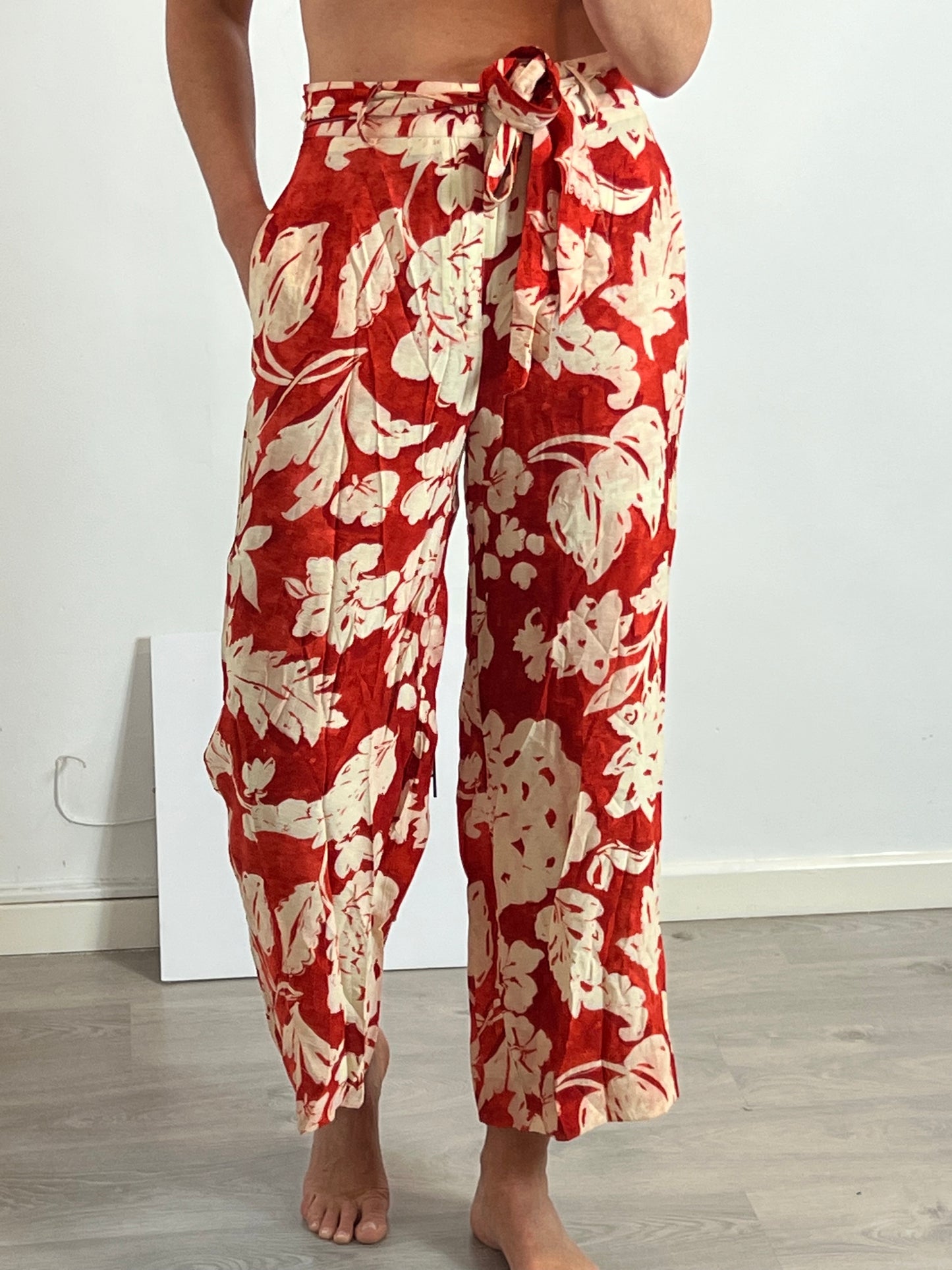 MANGO. Flowy floral trousers Tm