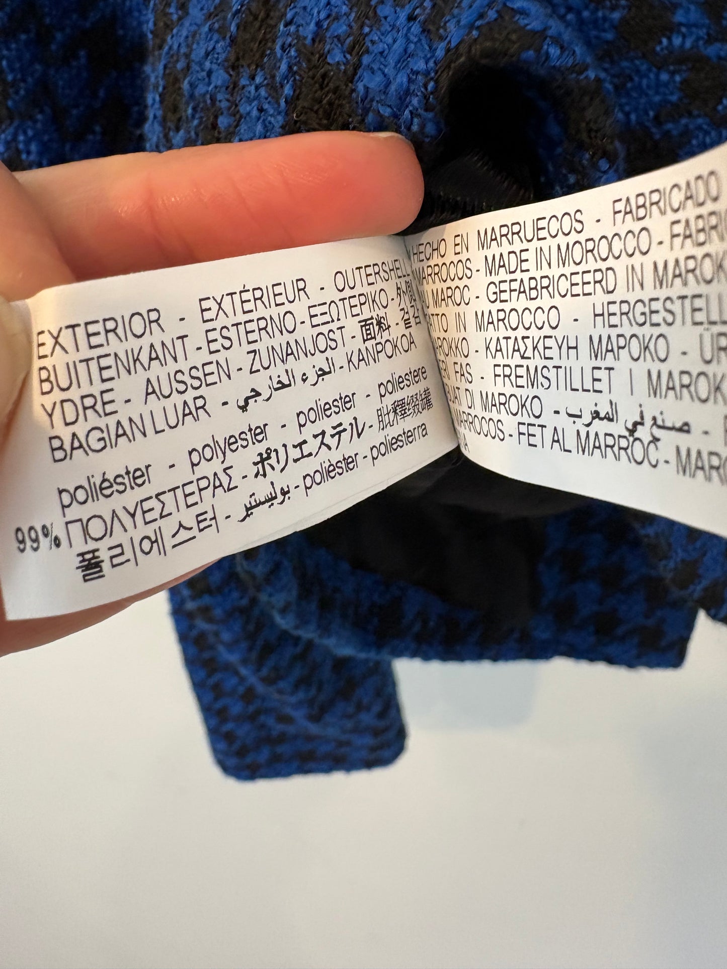 ZARA. Chaqueta tweed negra y azul