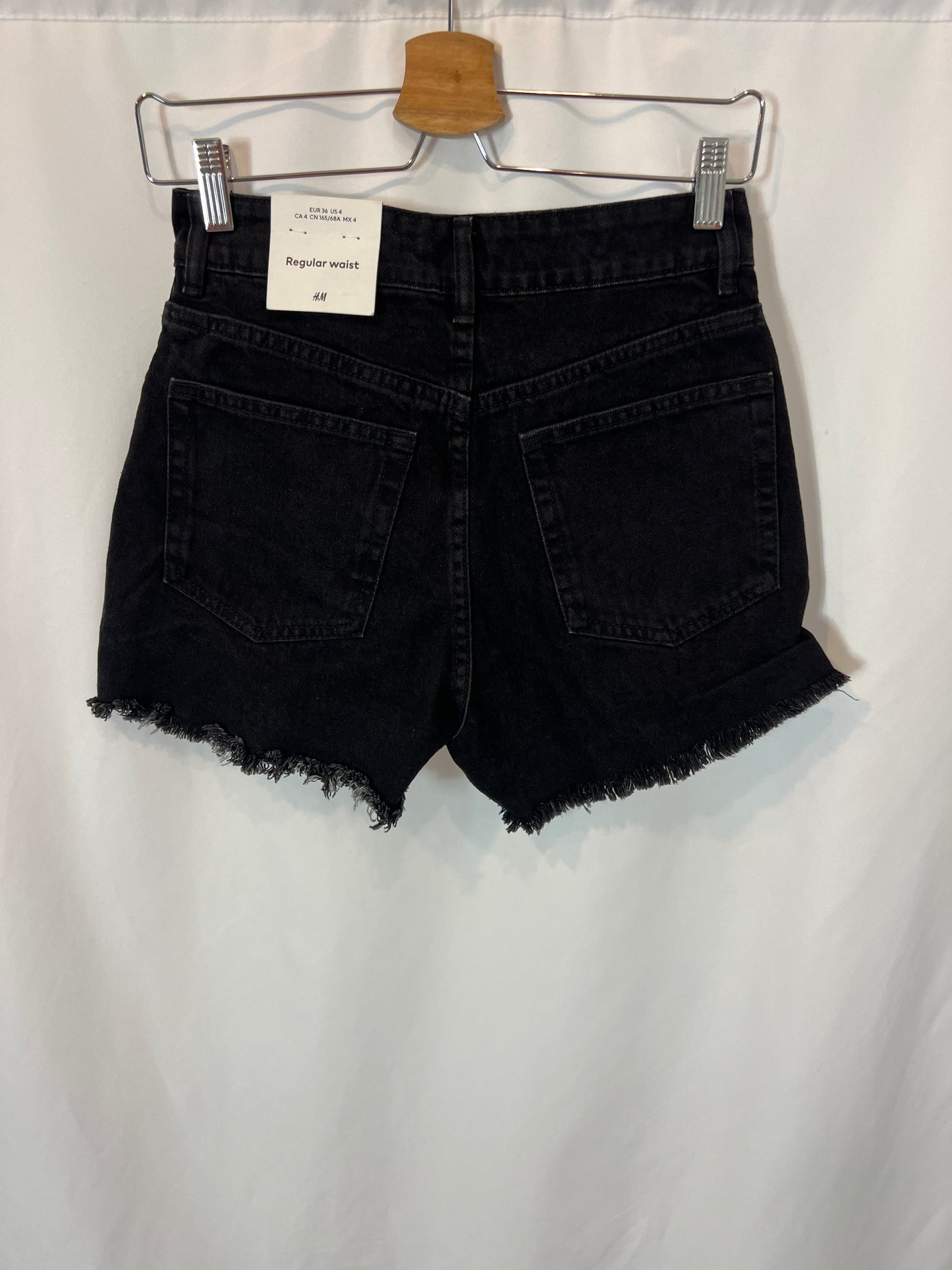 H&M. Denim short abotonado. T 36