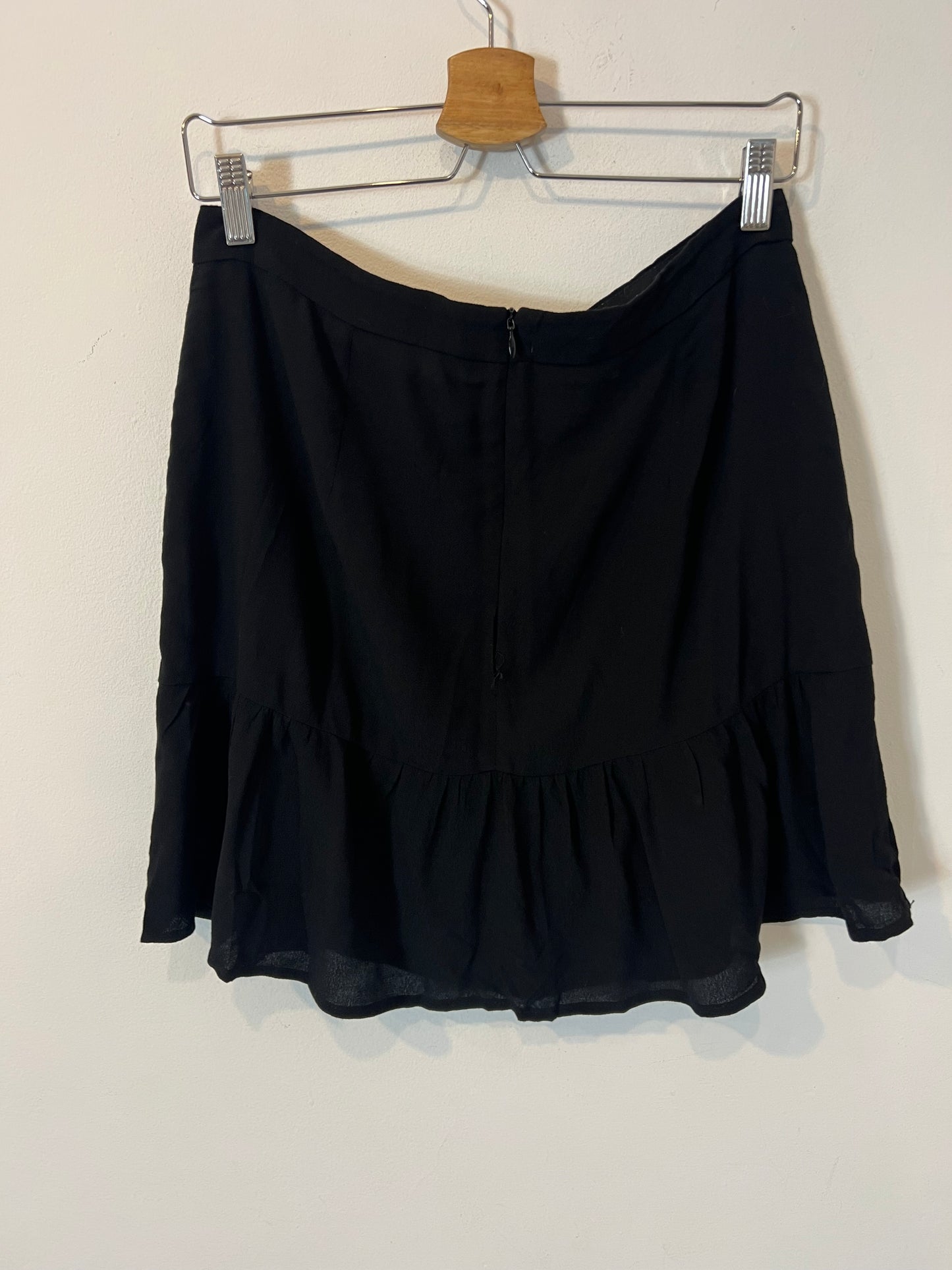 THAT OR THAT. Flowing black buttoned skirt. TL