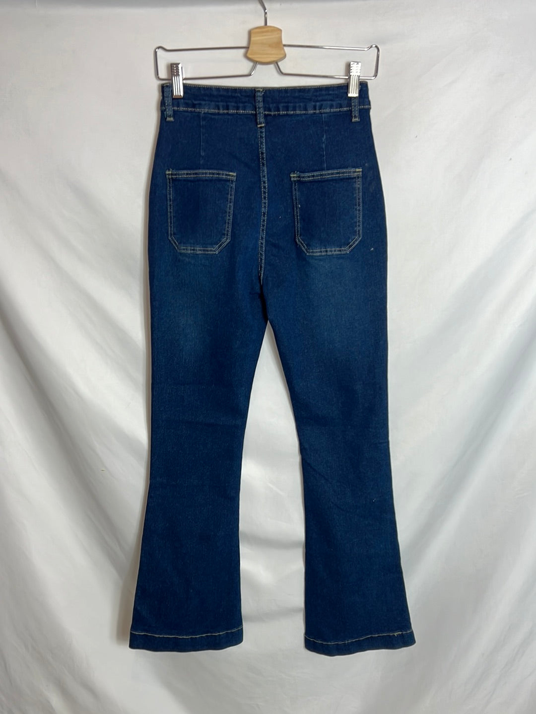 CÓMMENSE. Denim campana bolsillos . T S.