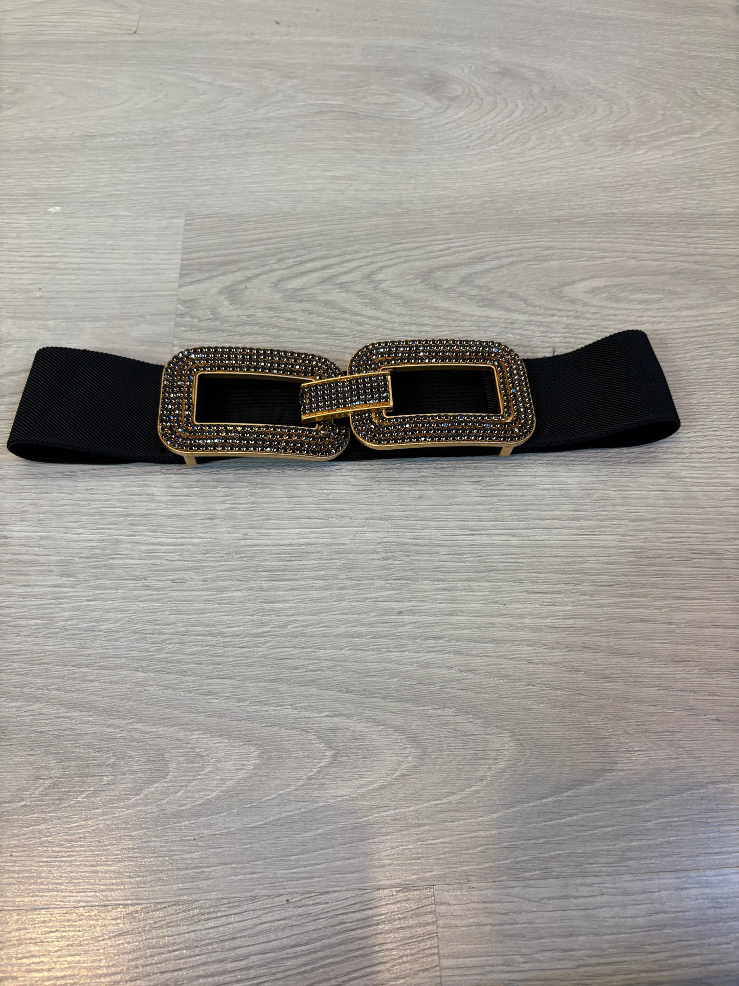 OTRAS. Cinturón negro elastico hebilla