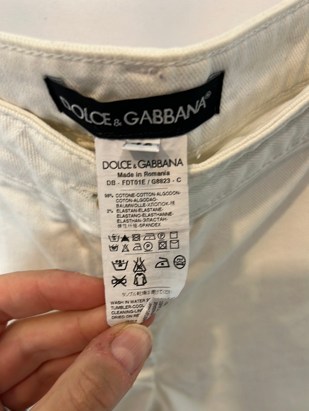 DOLCE&GABBANA. White denim shorts with lace detail. Size 40