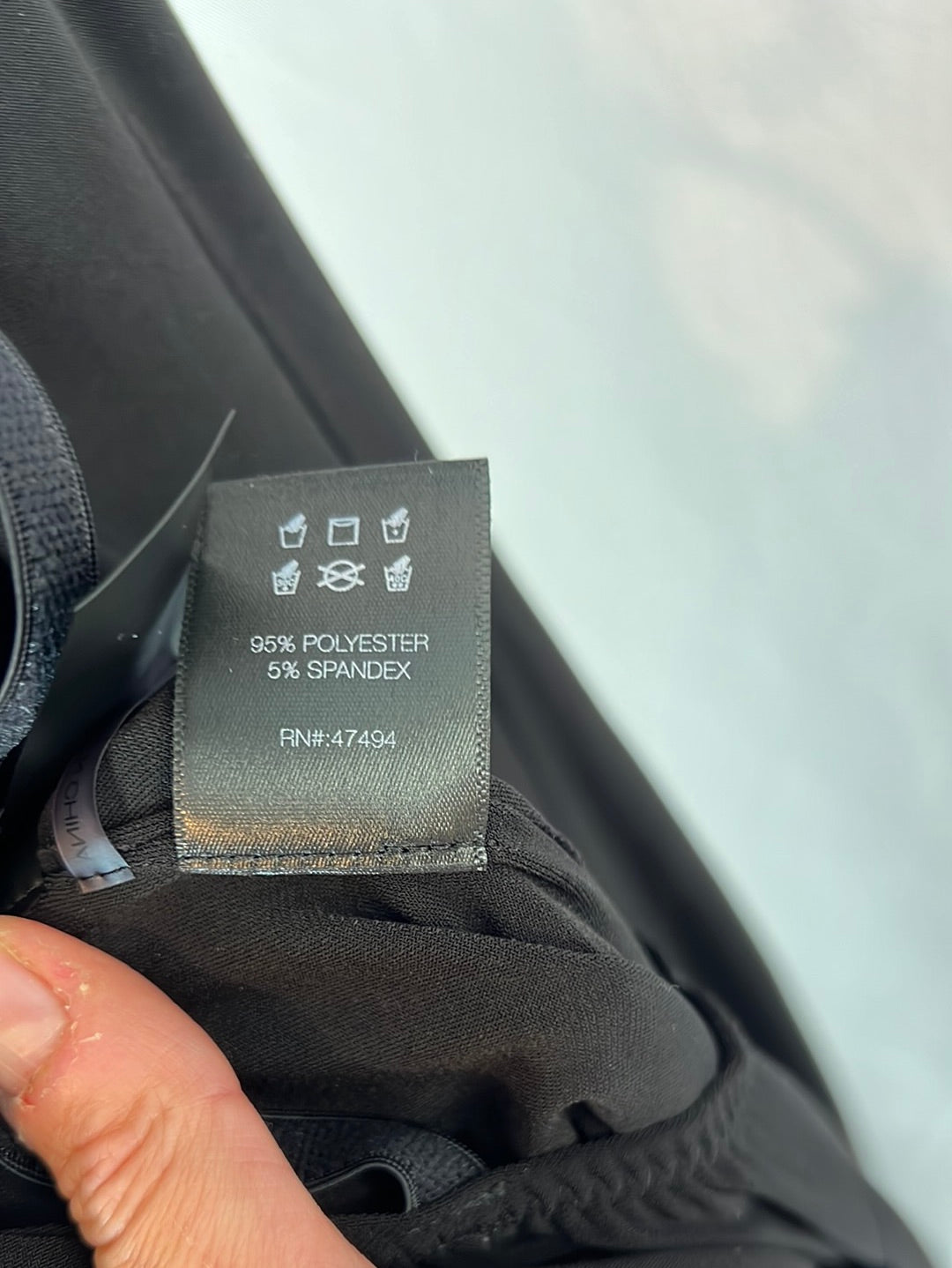 NORMAKAMALI. Black open back Ts jumpsuit