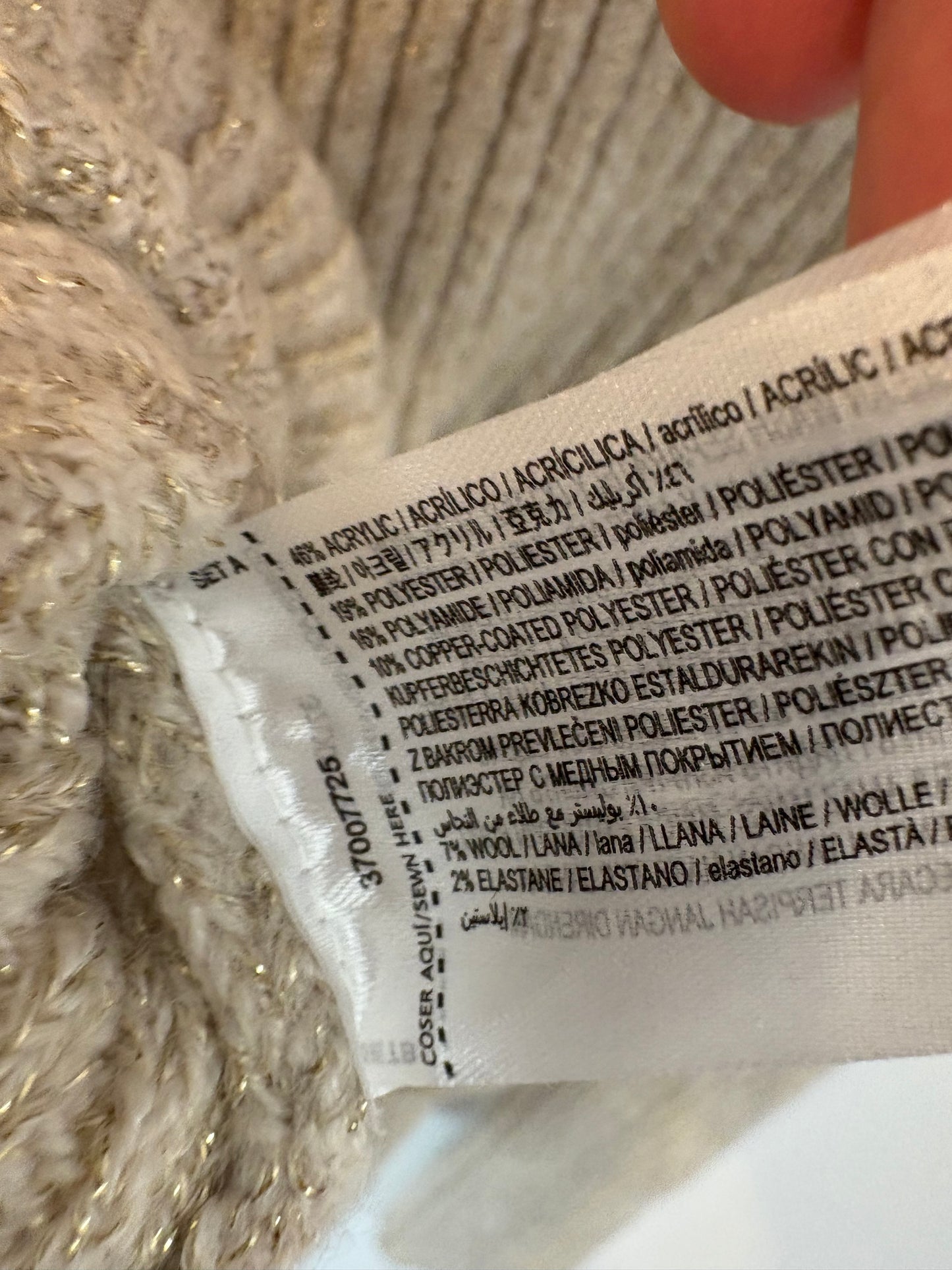 MANGO. Beige ribbed sweater with threads. TS