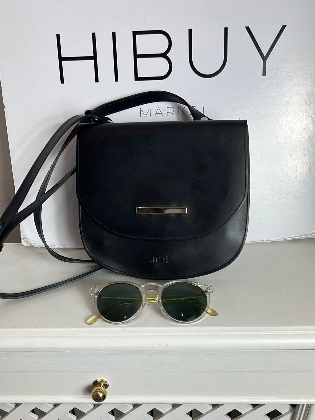 AMT. Flat black mini bag