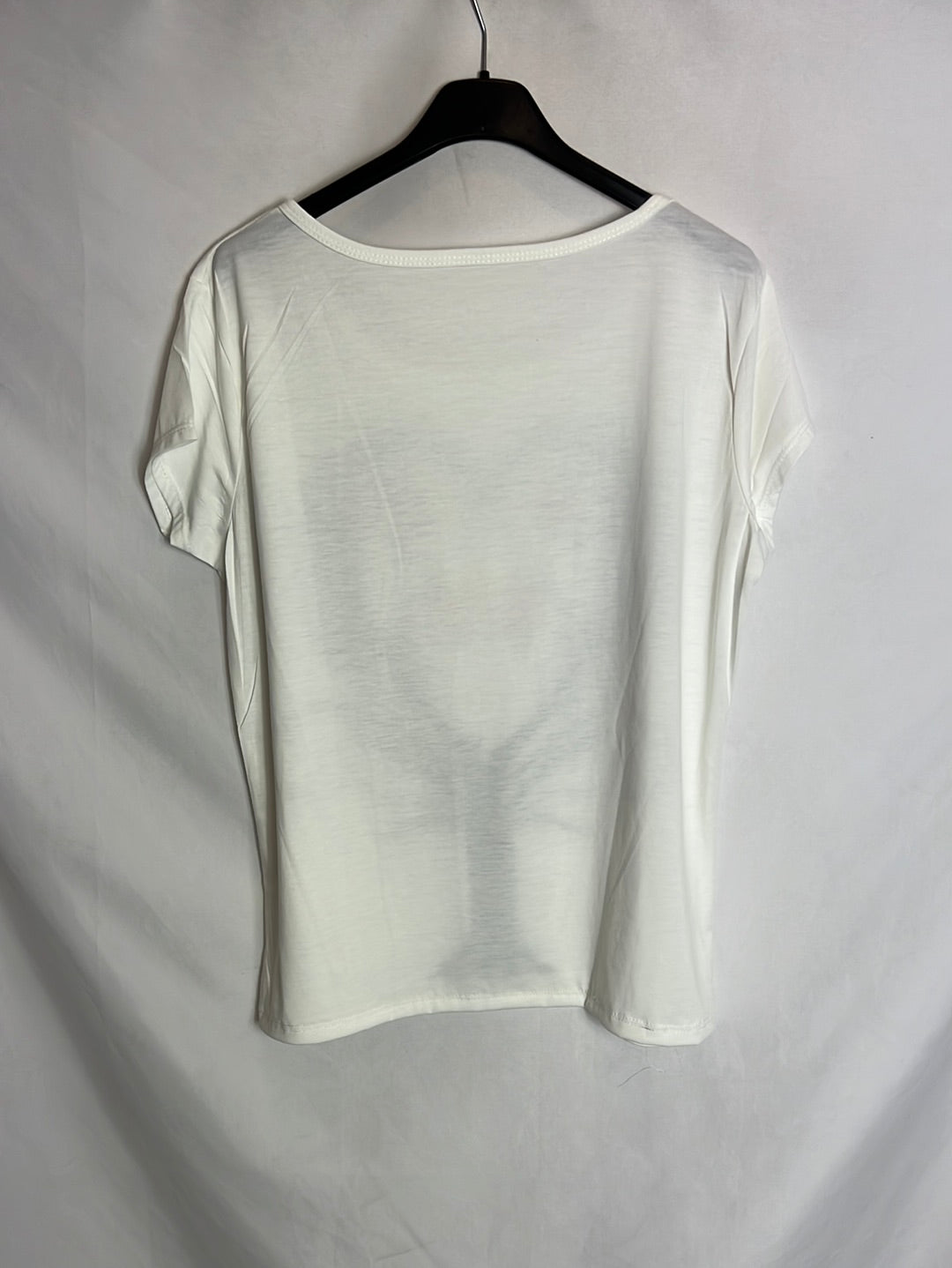 OTHERS. White flowing T-shirt with a pattern. TM