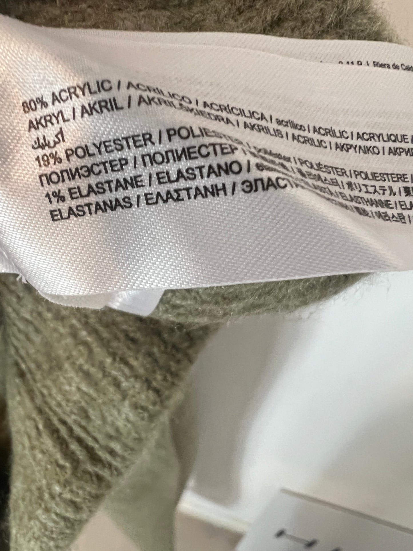 MANGO. Pantalón punto verde jaspeado. T M