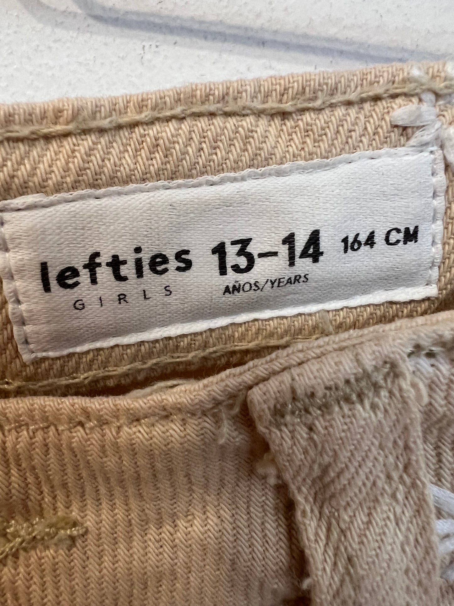 LEFTIES. Lightweight embroidered denim. Size 13-14 years (xs)
