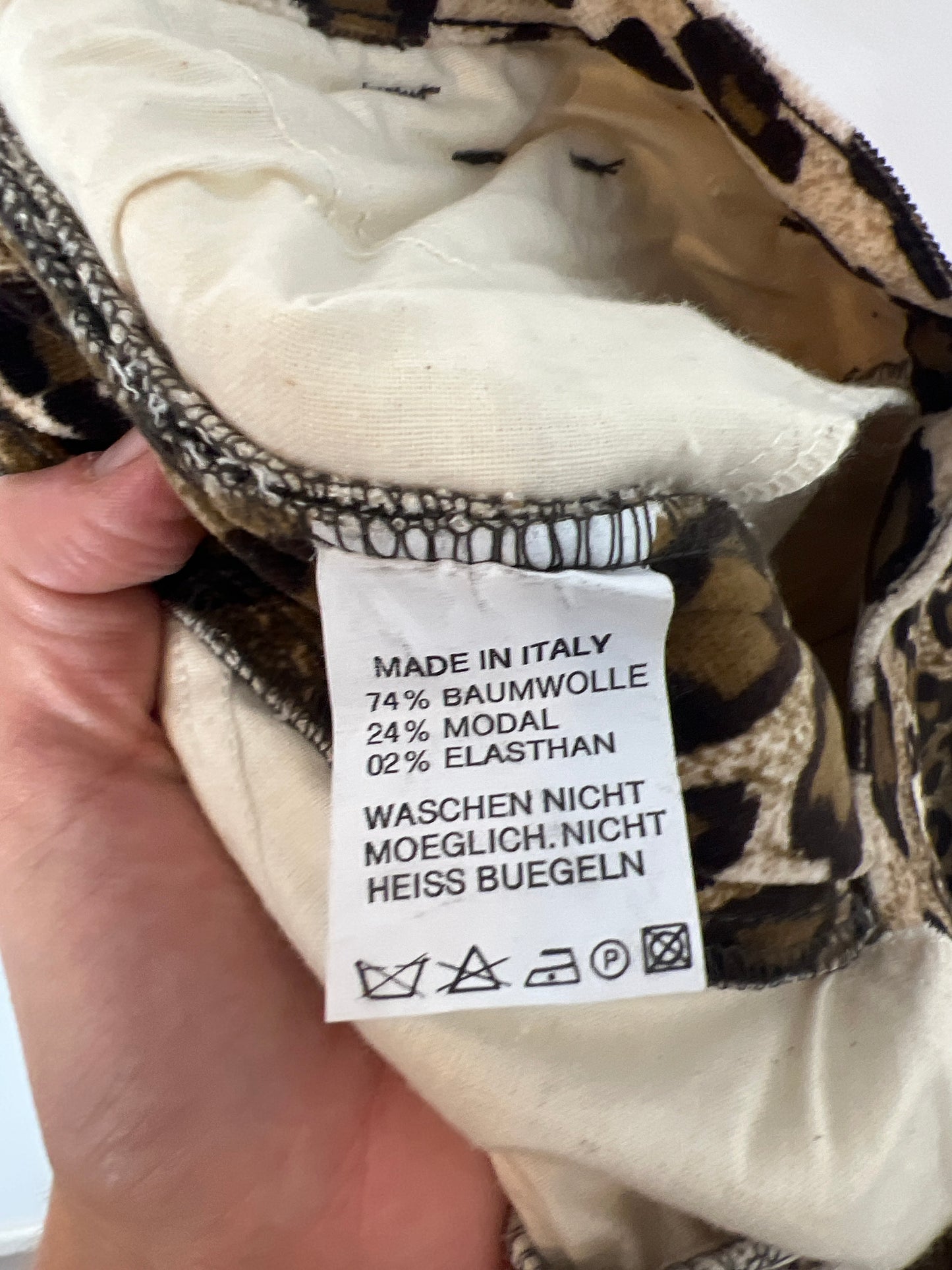 COTTON LINE. Textured animal print trousers. Size 31 (38)