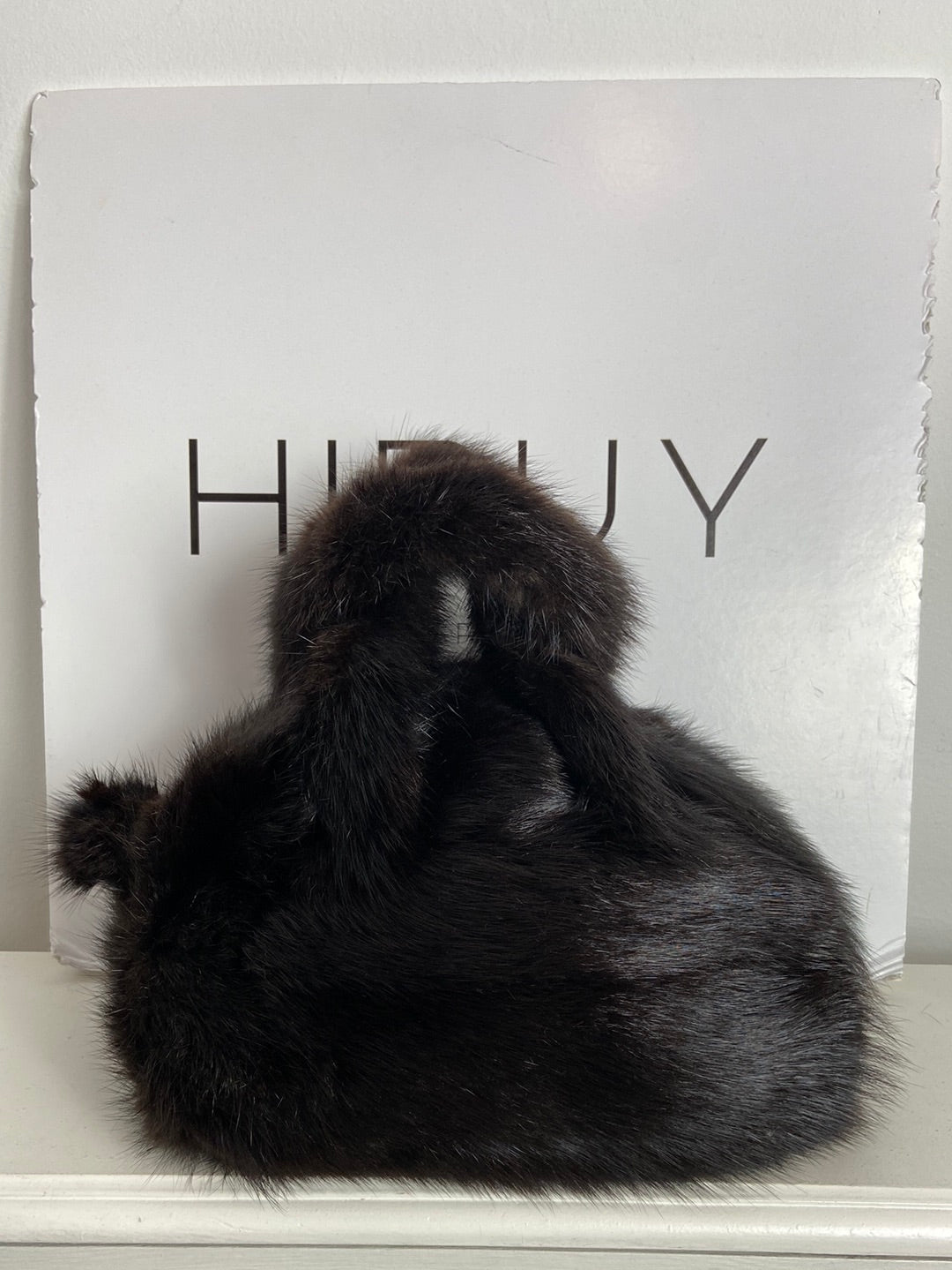 OTRAS. Bolso pelo negro