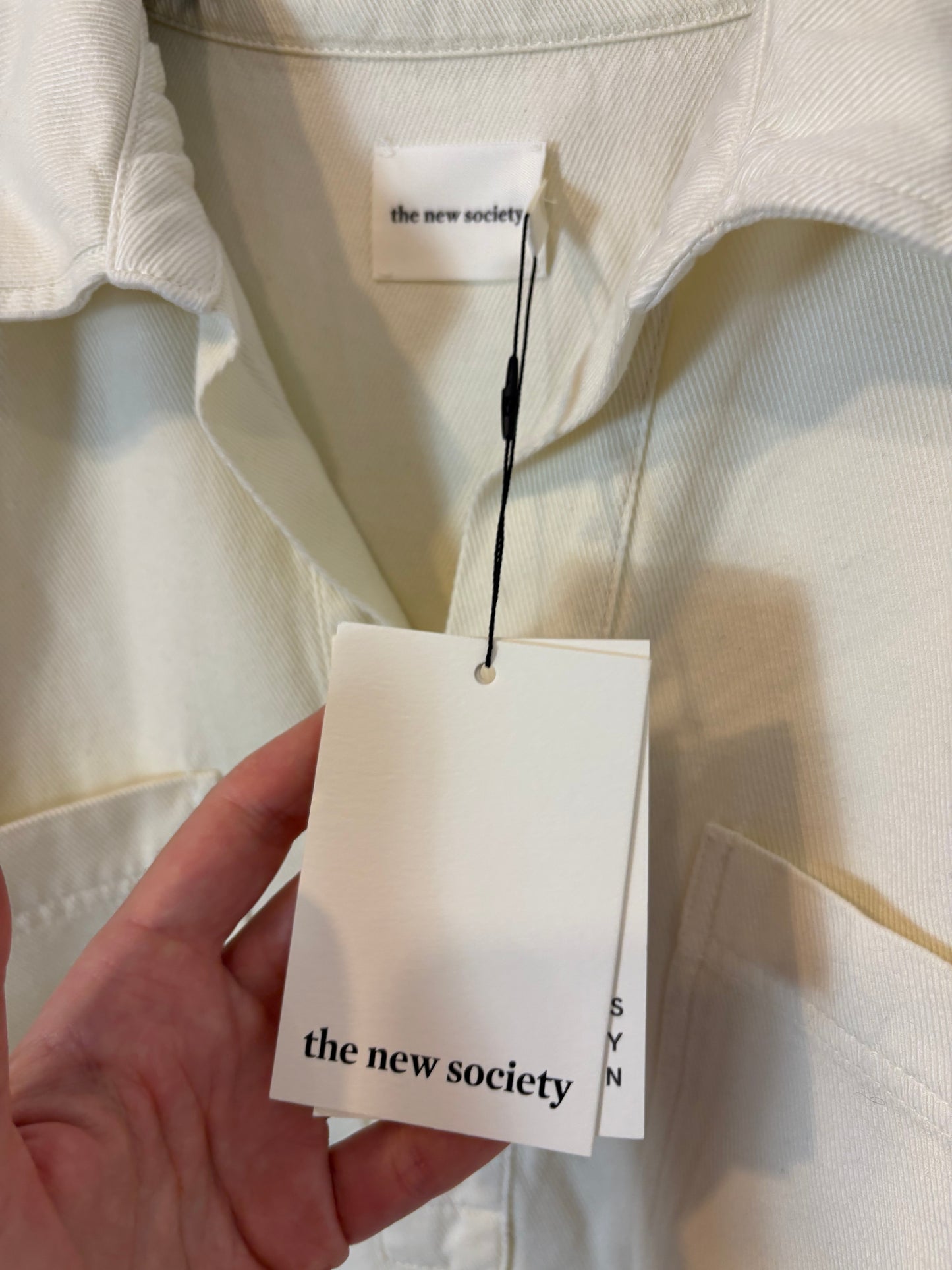 THE NEW SOCIETY. Ecru shirt. TS