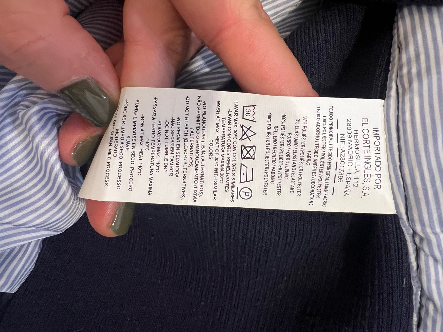 LLOYD'S. Blue down jacket with suede detailing.