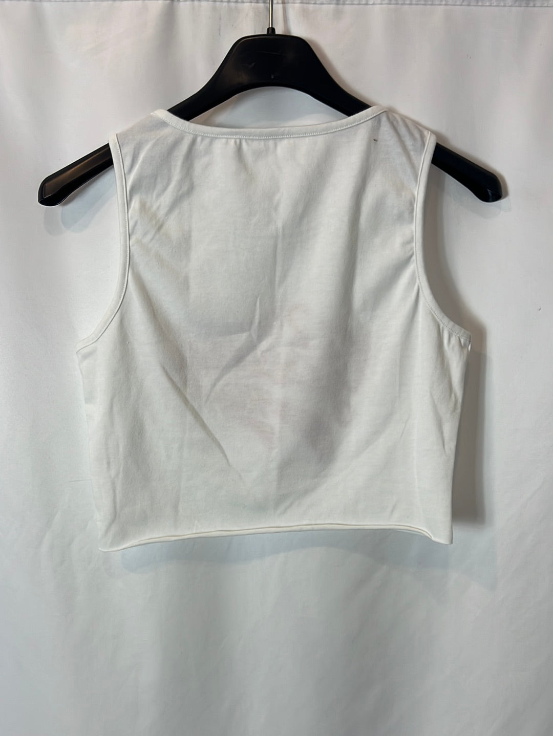 OTHERS. White crop top with red letters. S XS/S