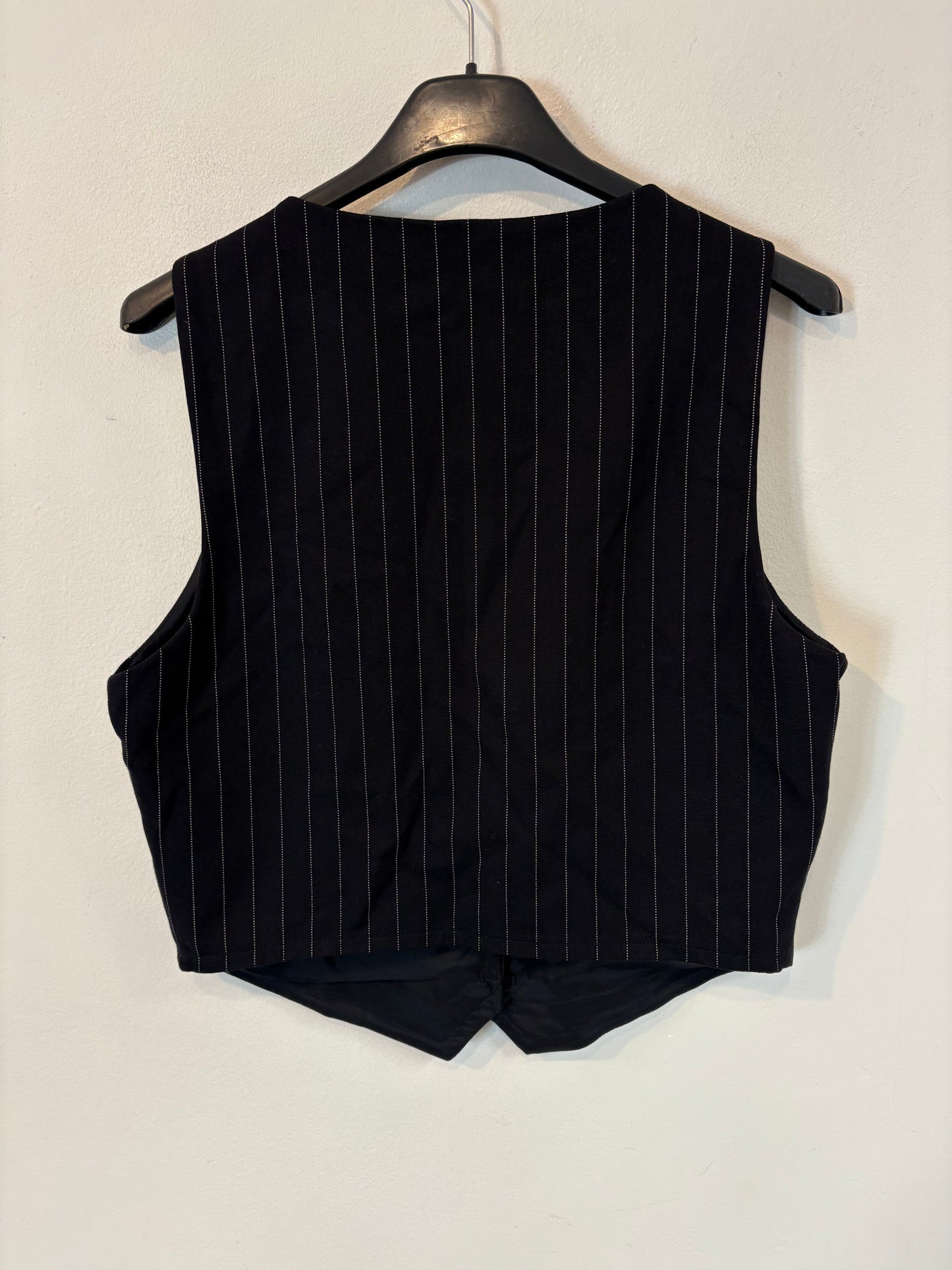 ZARA. Chaleco negro rayas