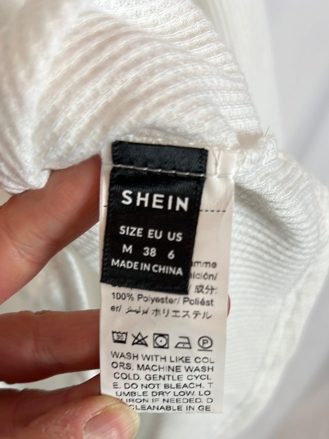 SHEIN. Top blanco textura manga larga. T M