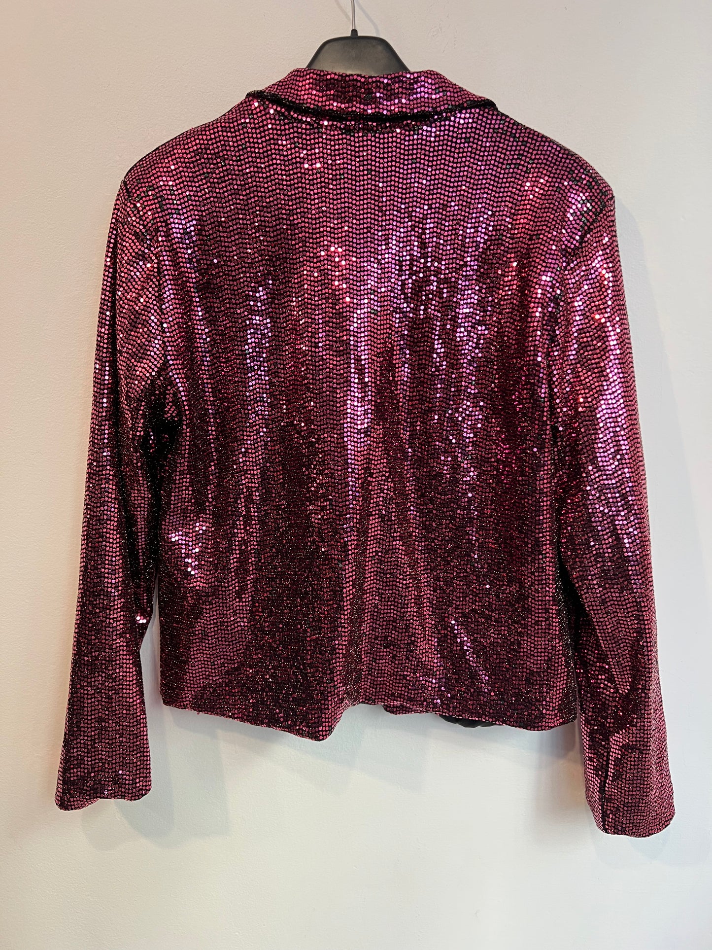 OTRAS. Chaqueta textura metalizada rosa. T M