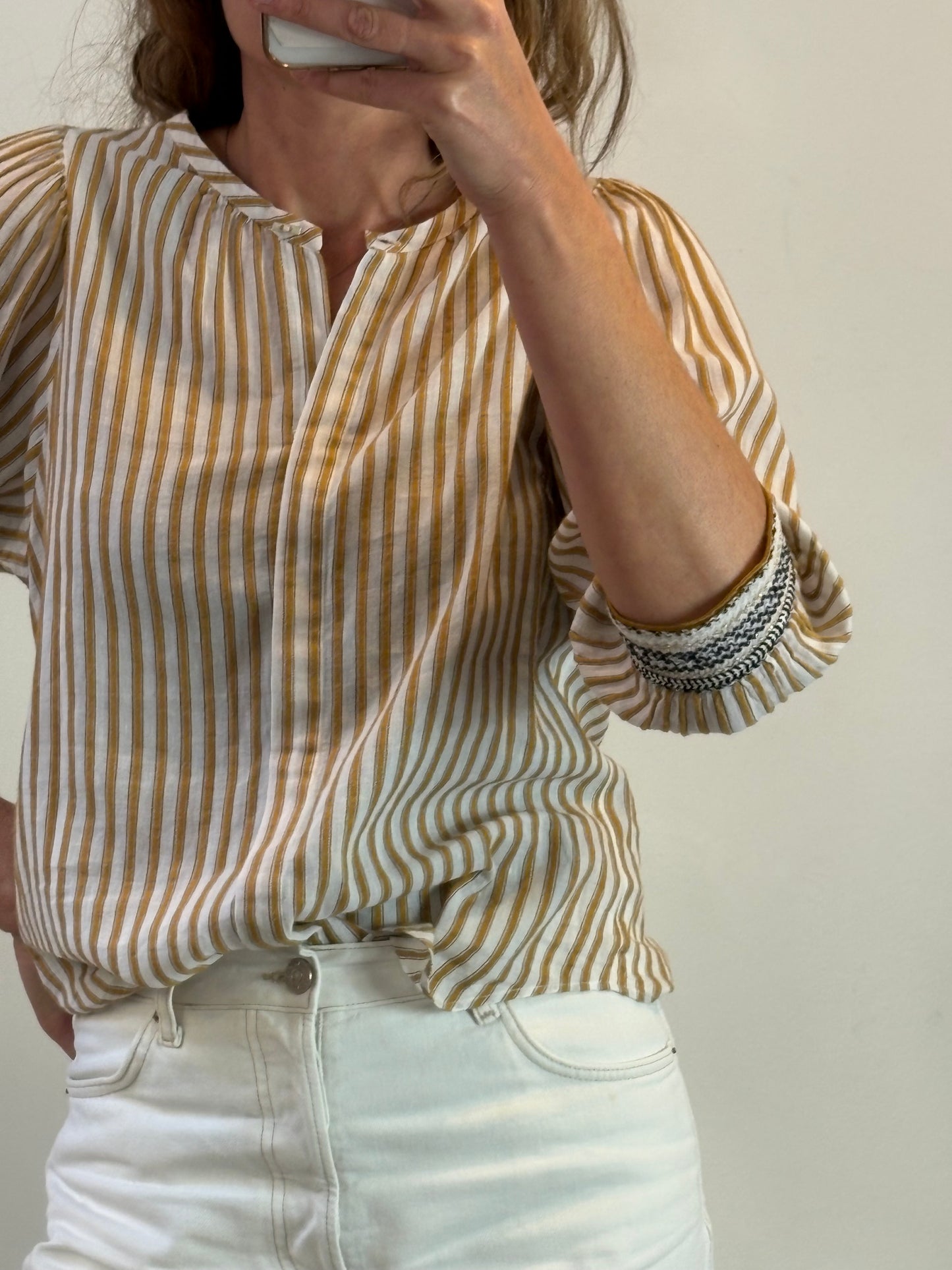 SESSÚN. Blusa rayas detalle puños