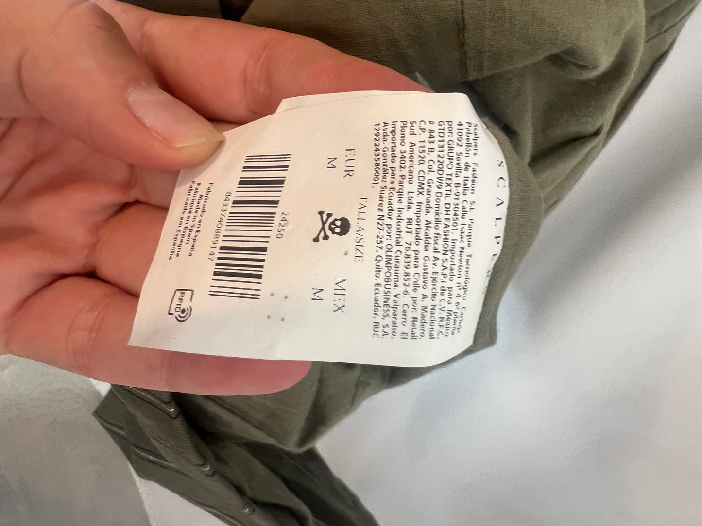 SCALPERS. Striped green vest. TM