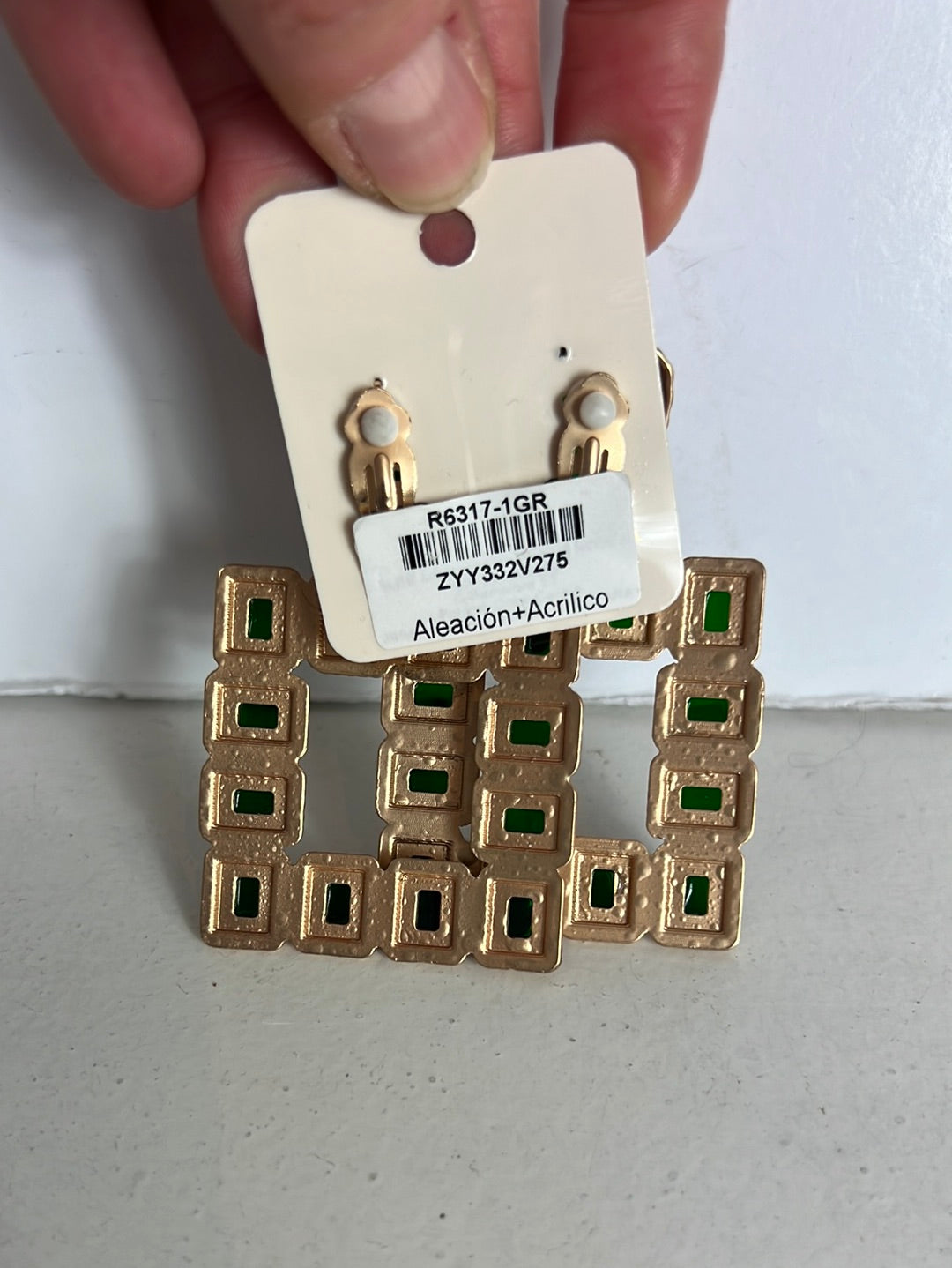 OTHERS. Gold and green earrings