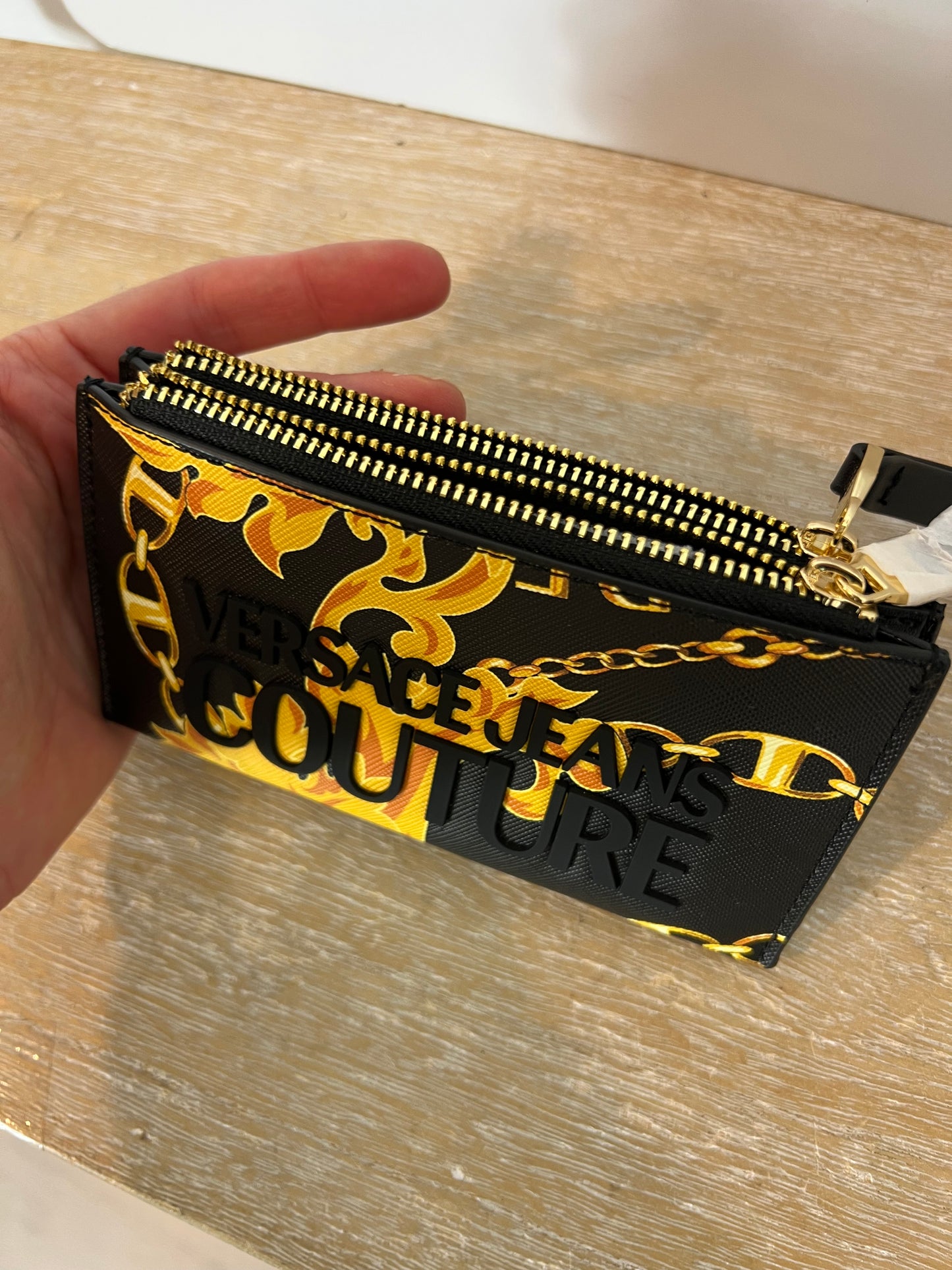 VERSACE JEANS COUTURE. Double-handle bag and gold-tone buckle coin purse.