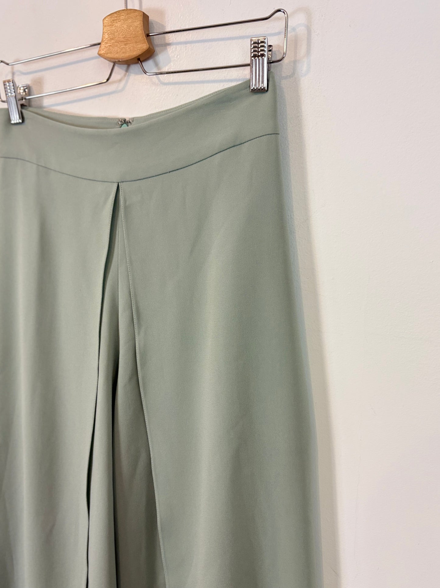 ROBERTO TORRETTA. Green trousers with slits. Size 36
