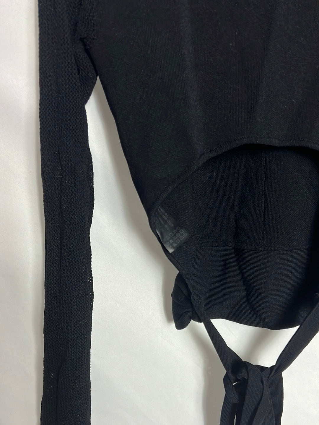 ZARA. Black knit top with back opening. TM