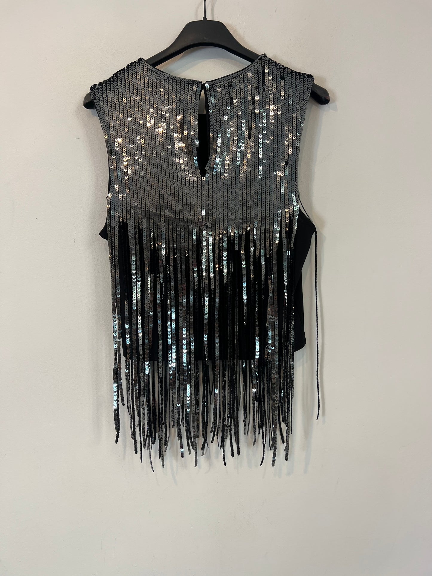 H&M. Top lentejuelas flecos T.s