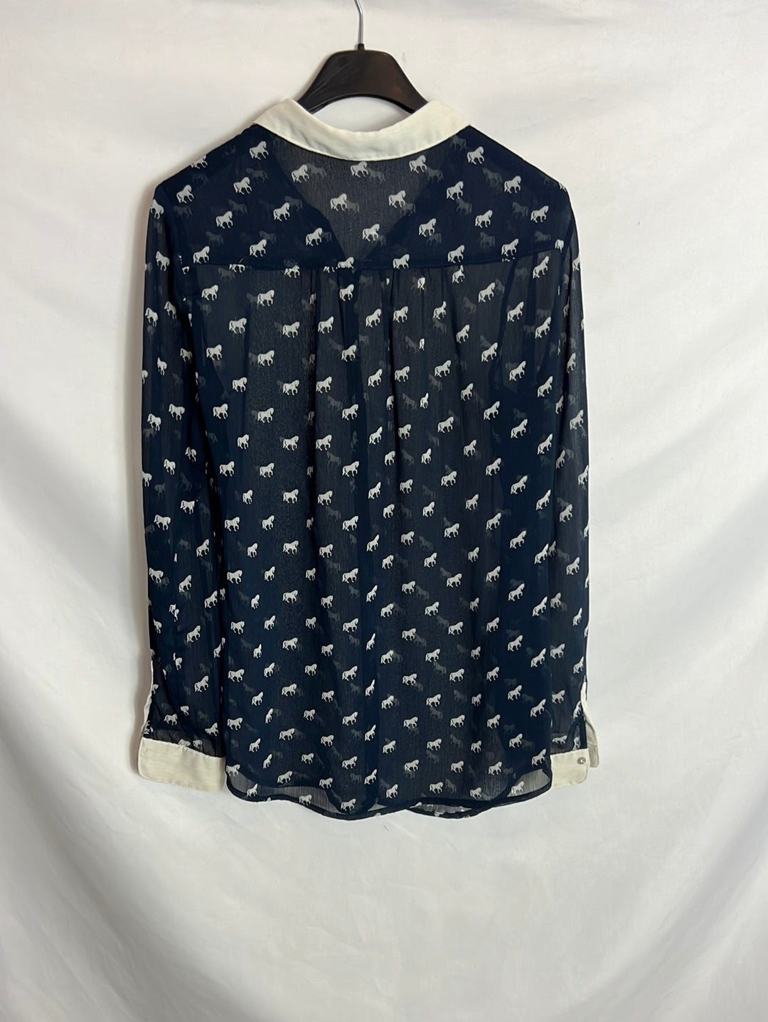ZARA. Blusa azul semitransparente caballos. T XS