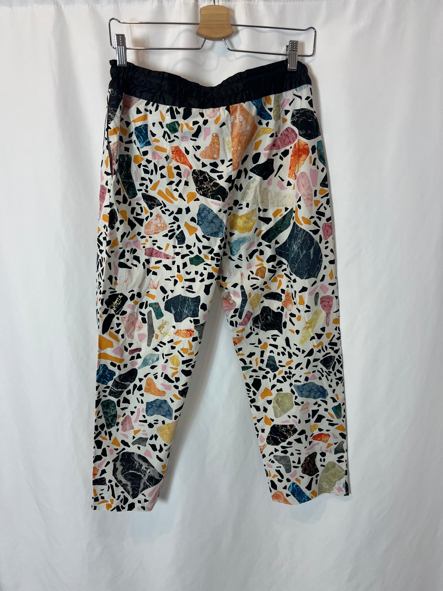 BIMBA Y LOLA. Textured print trousers. Size 40