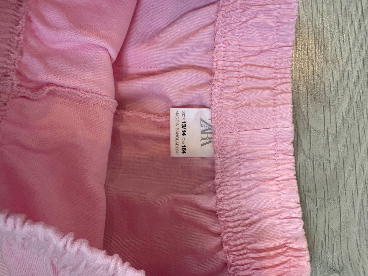 ZARA. Conjunto felpa rosa dibujos. T 13-14 años (xs)