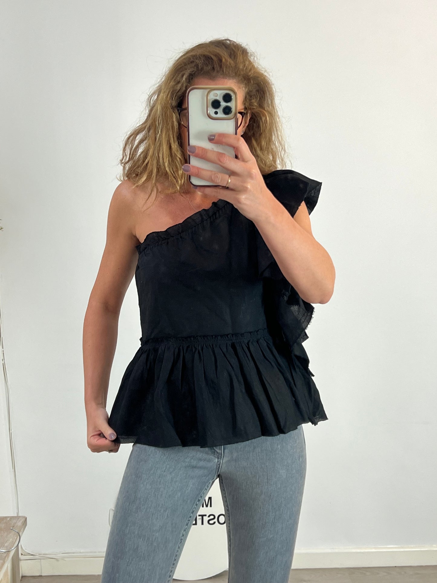 IRO. Asymmetrical black top with flounce. T 40