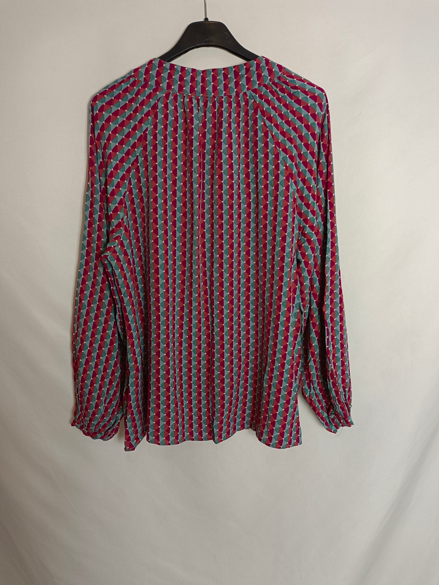 UNIT. Blusa geometríca T.s