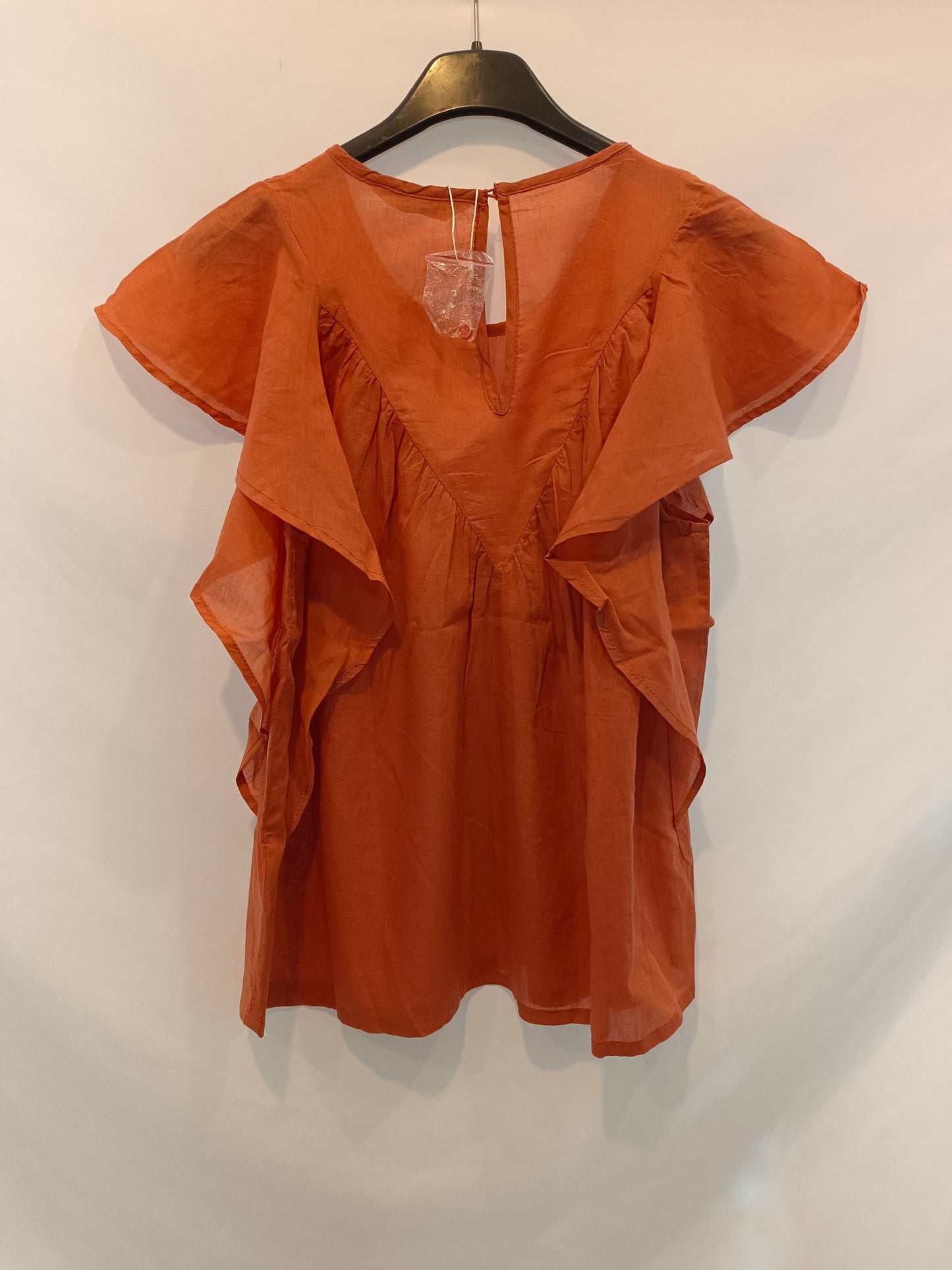 Fantastic company. Orange ruffled Ts blouse