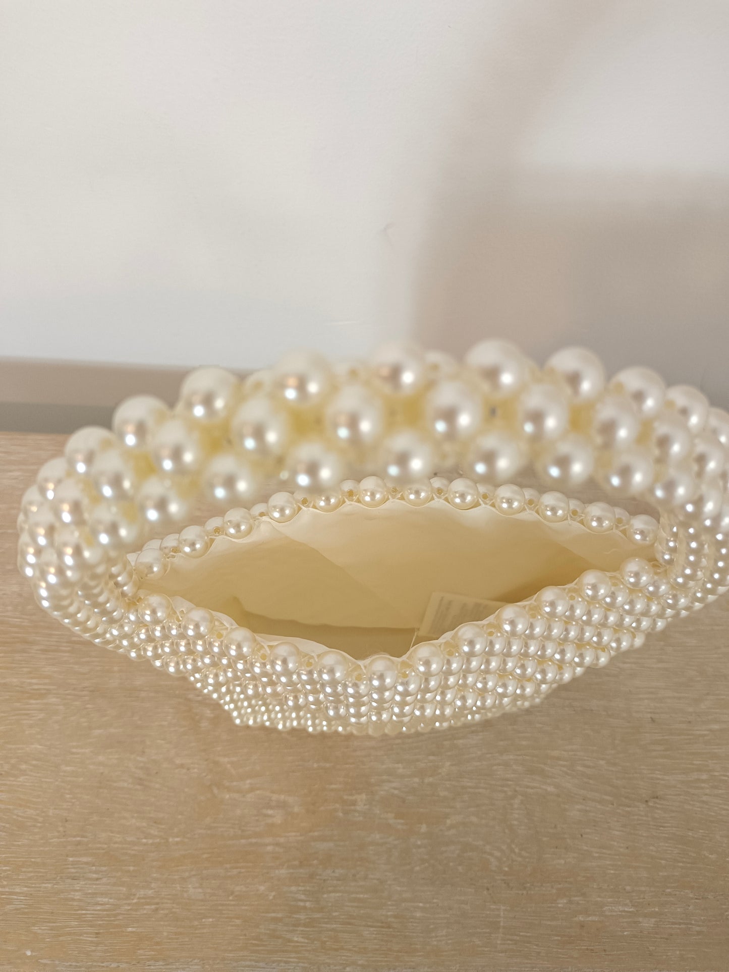 H&M. Short-handled pearl bag