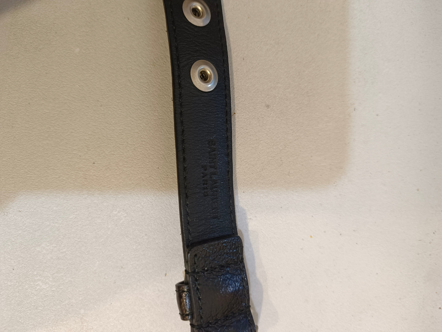 SAINT LAUREN. Studded slim belt S.100