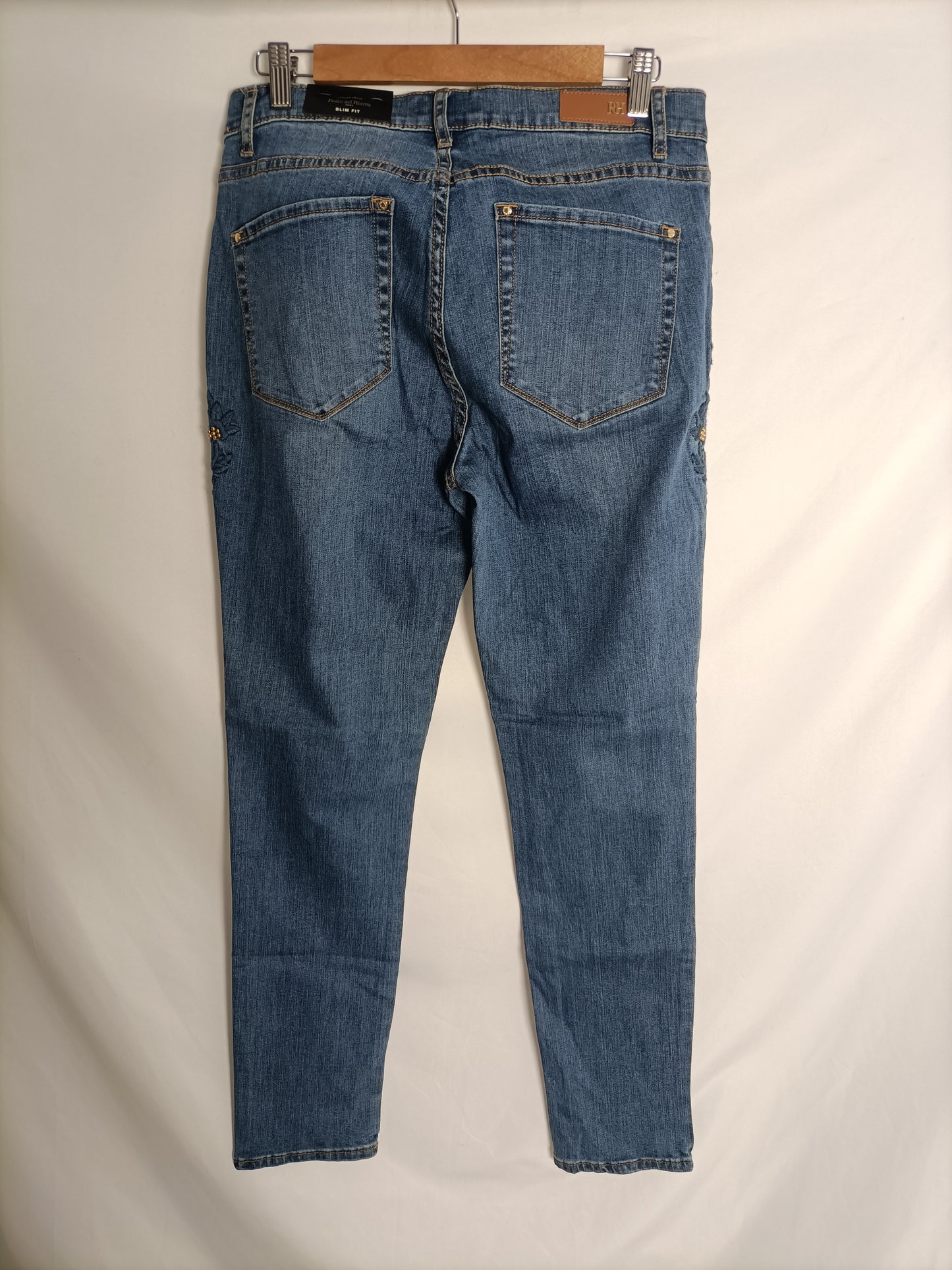 PEDRO DEL HIERRO. Blue jeans with floral detail, size 44