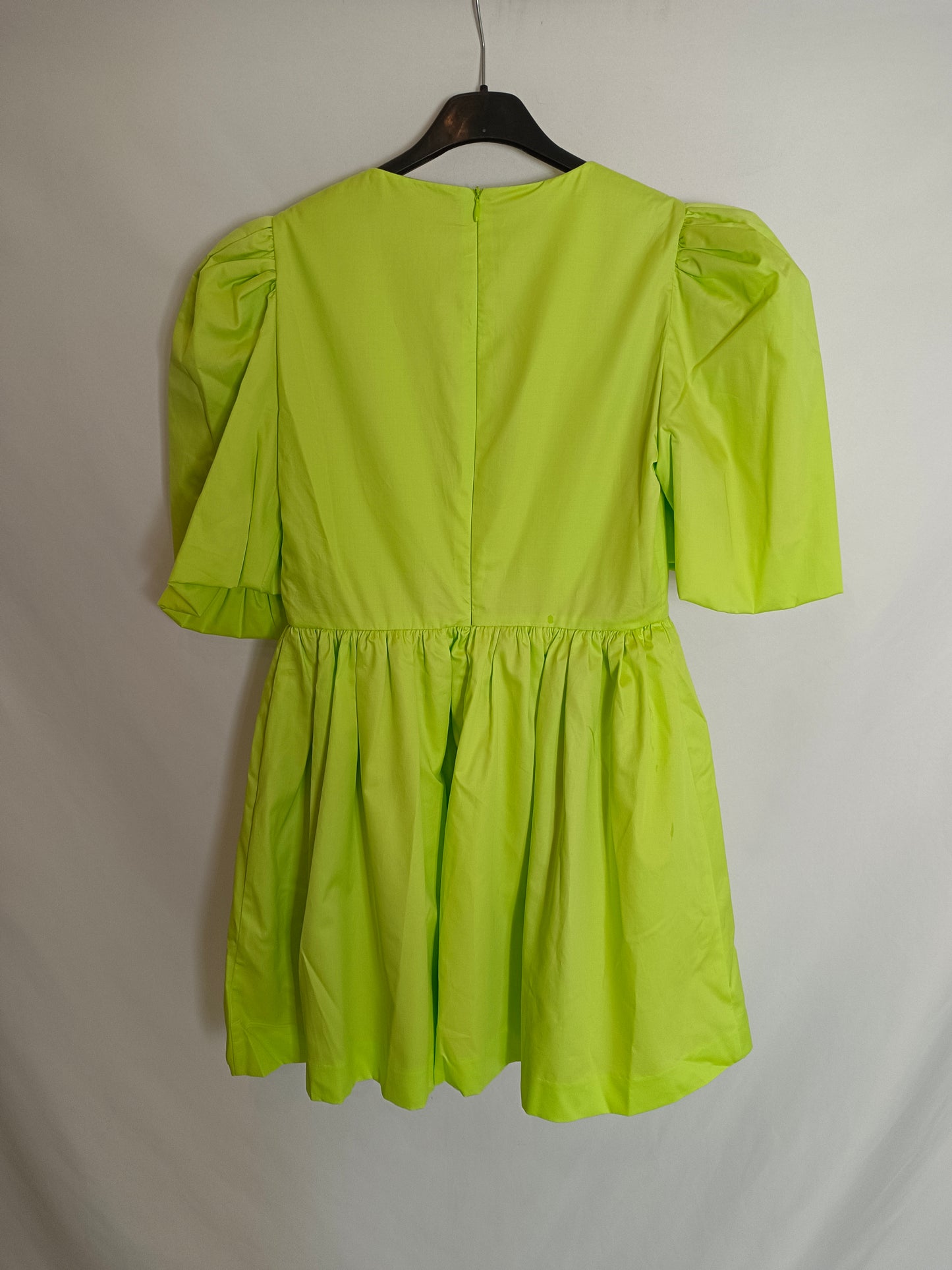 CARMEN HORNEROS. Short green Ts dress