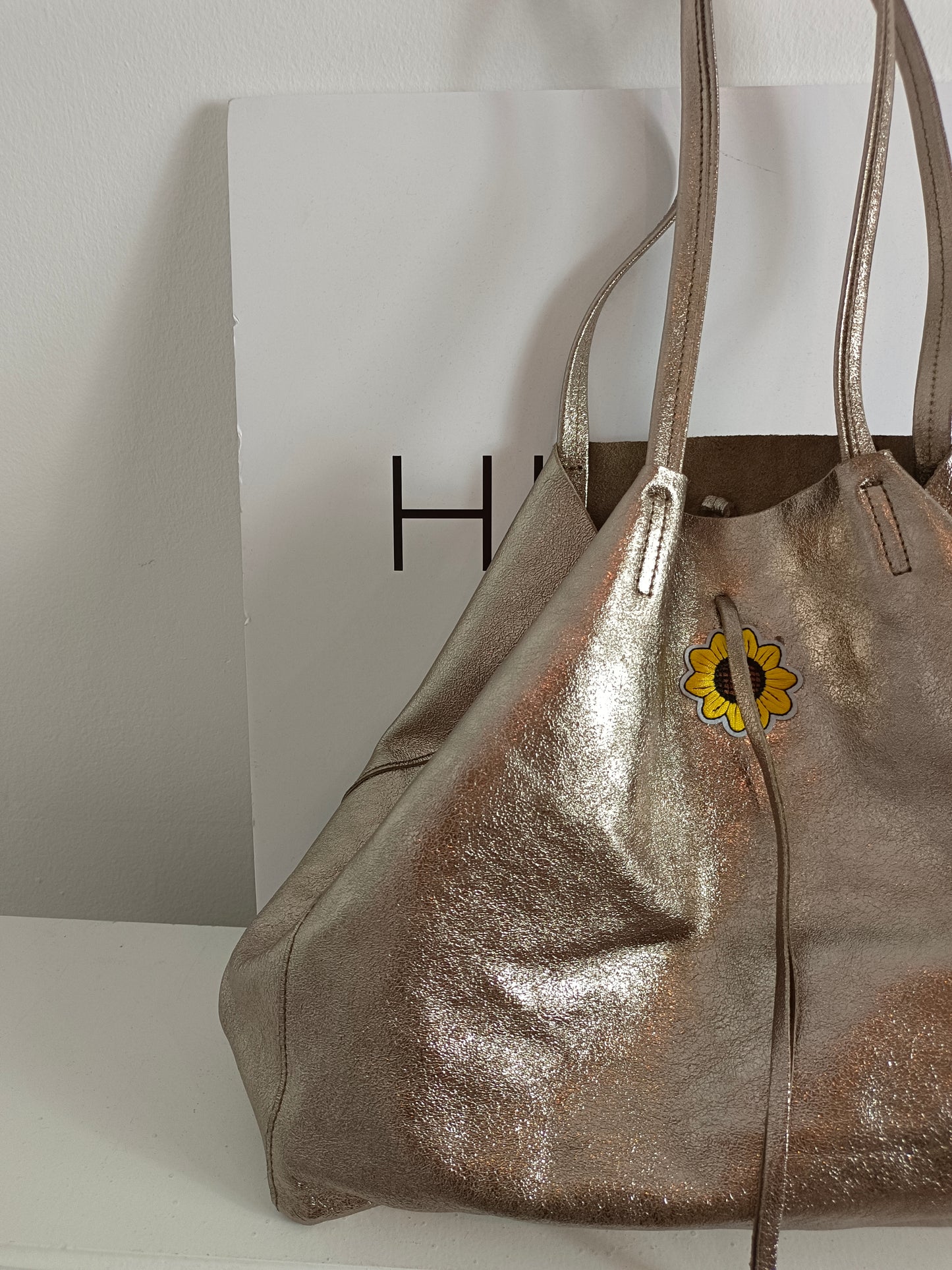 MADREFIERA. Bolso cobre purpurina